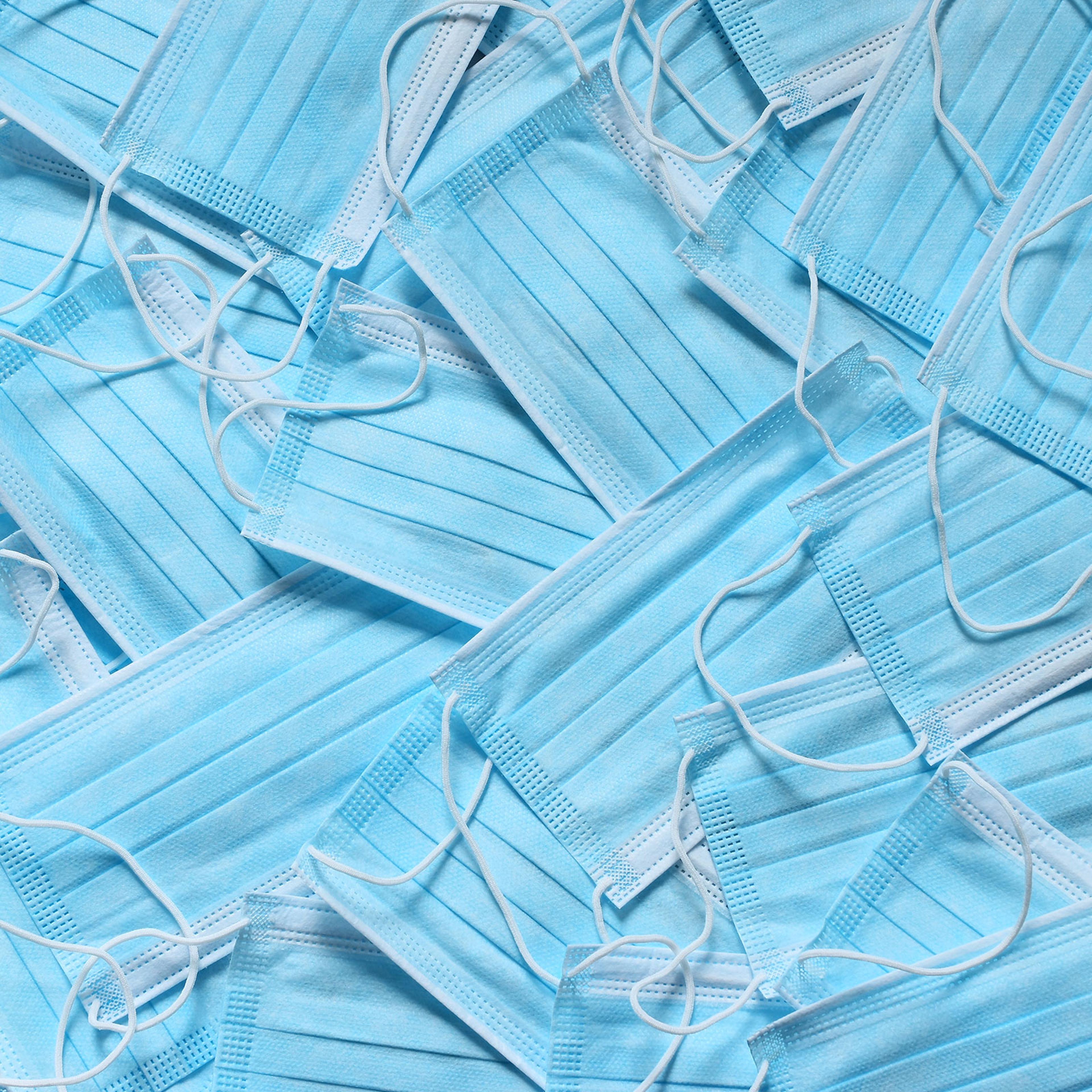 a pile of medical face masks