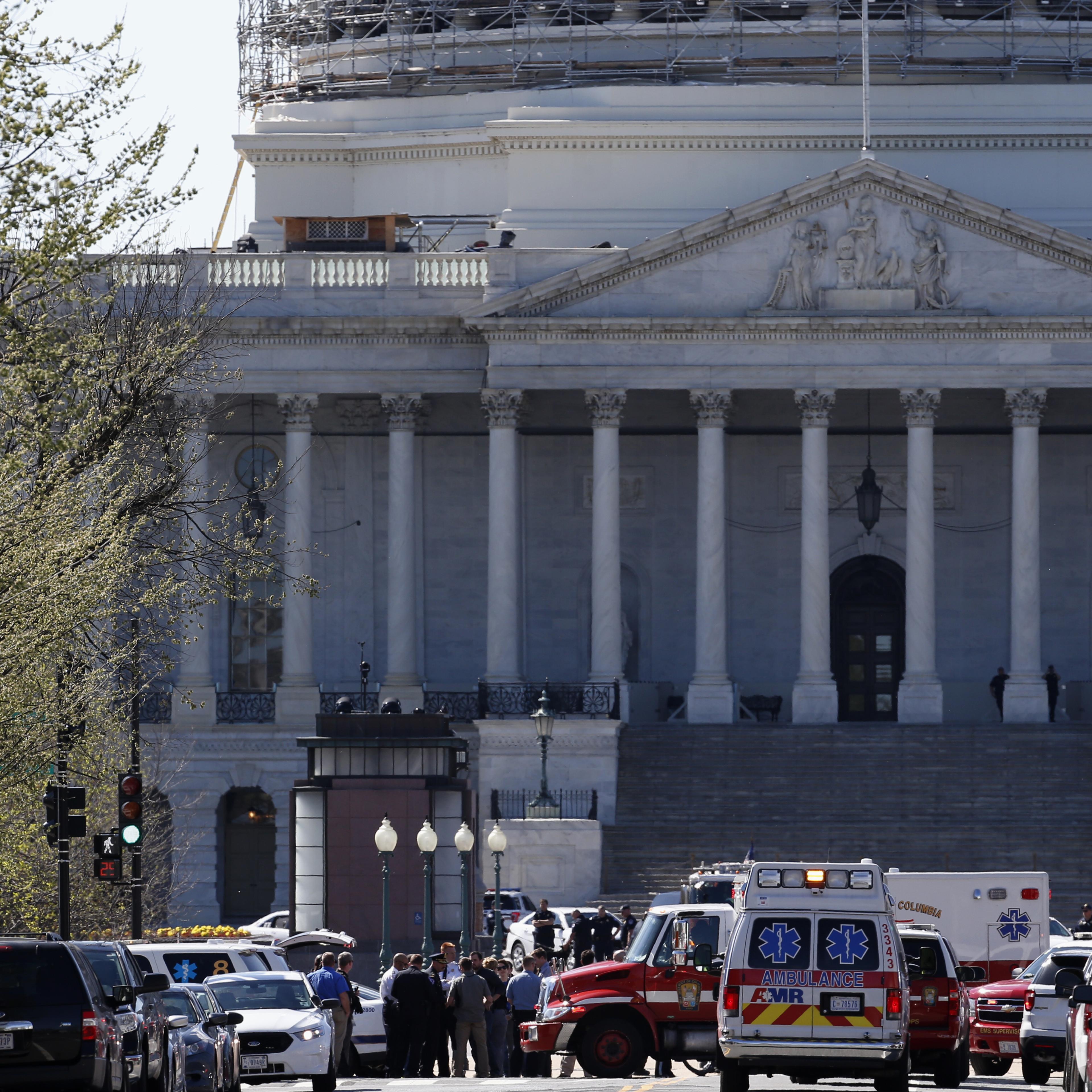 Law Enforcement and rescue vehicles are seen on Capitol Hill in Washington, DC on March 28, 2016, after a U.S. Capitol Police officer was shot at the Capitol Visitor Center complex, and the shooter was taken into custody.