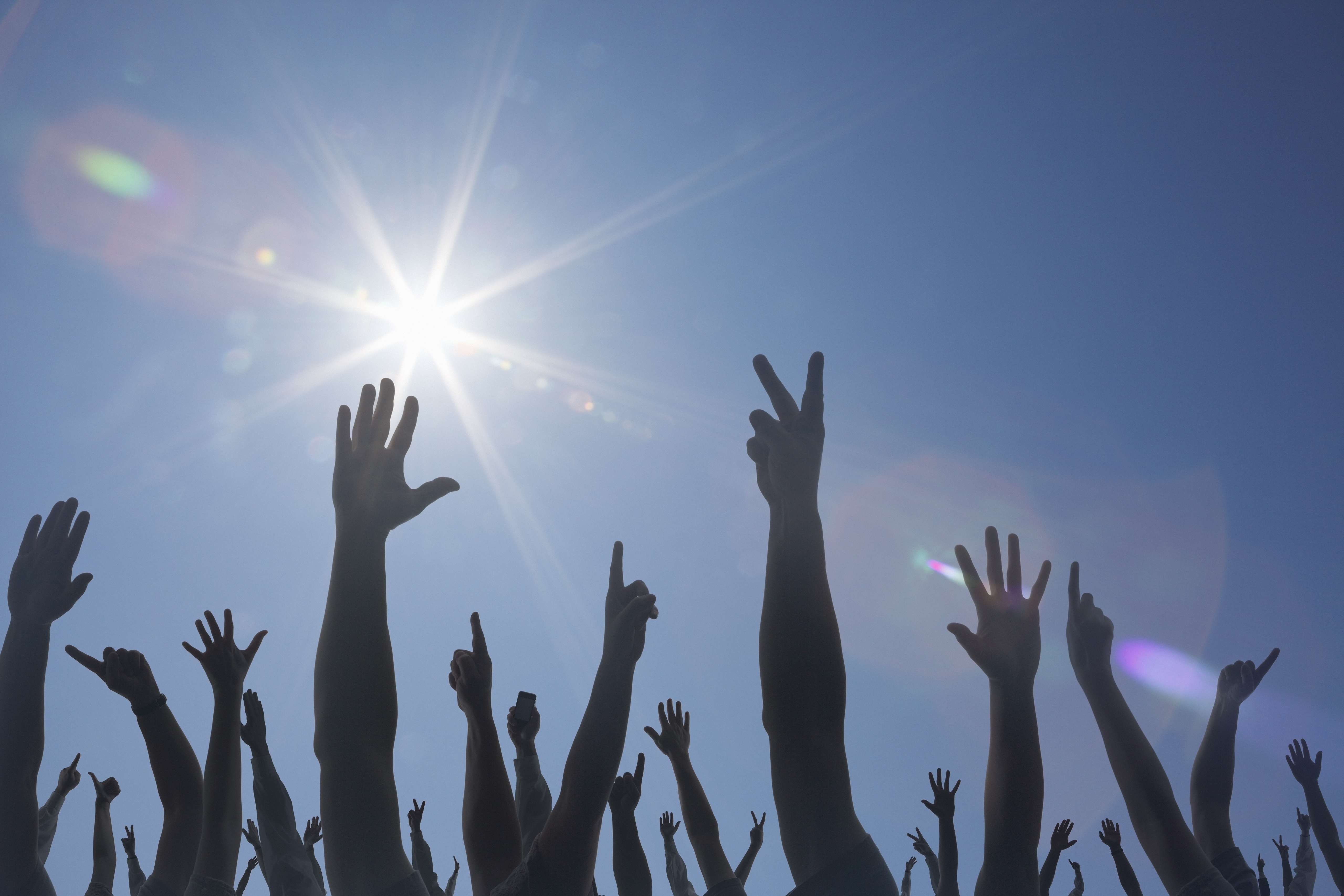 Crowd with Hands in Air