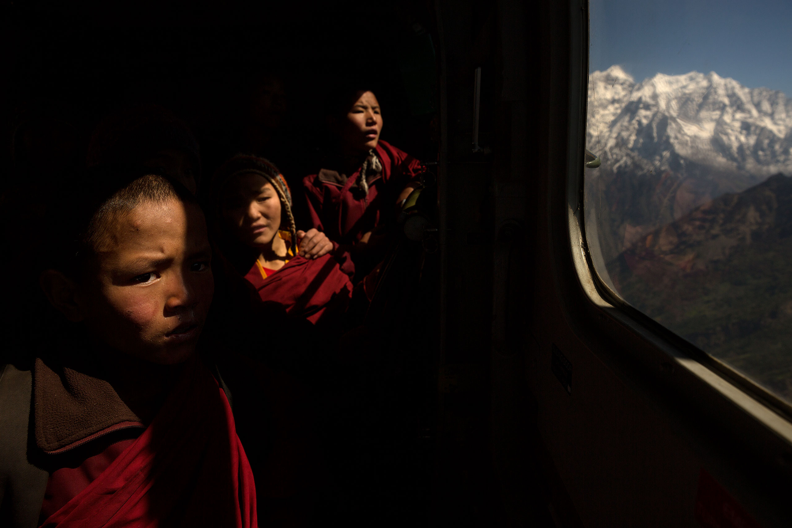 Nepal earthquake. Young Buddhist monks from Hinang Gompa (monastery) in the village of Lhi in Gorkha district in the Annapurna Range of the Himalayas were transported by Indian Army helicopter to Pokhara because the monastery was damaged in the earthquak