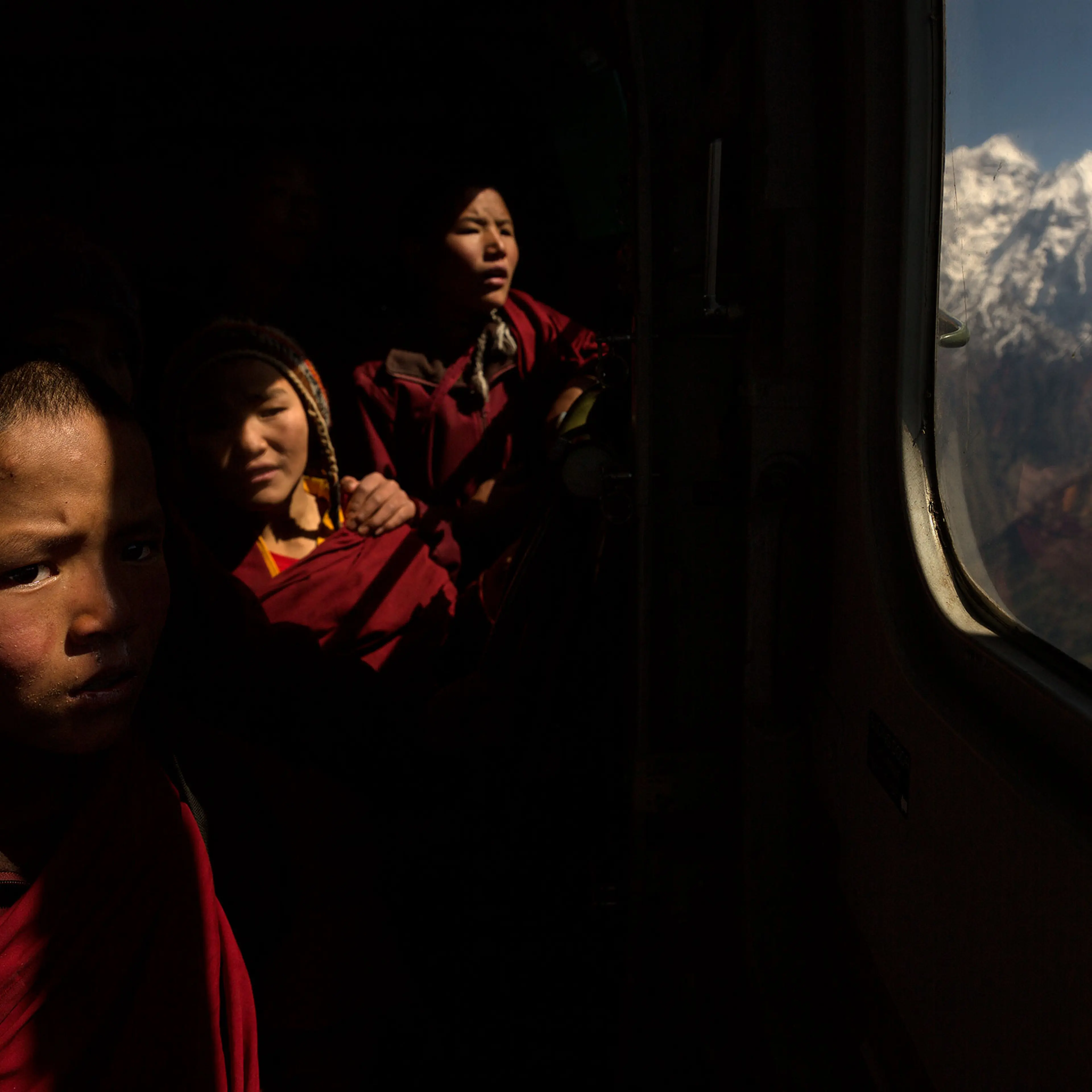 Nepal earthquake. Young Buddhist monks from Hinang Gompa (monastery) in the village of Lhi in Gorkha district in the Annapurna Range of the Himalayas were transported by Indian Army helicopter to Pokhara because the monastery was damaged in the earthquak