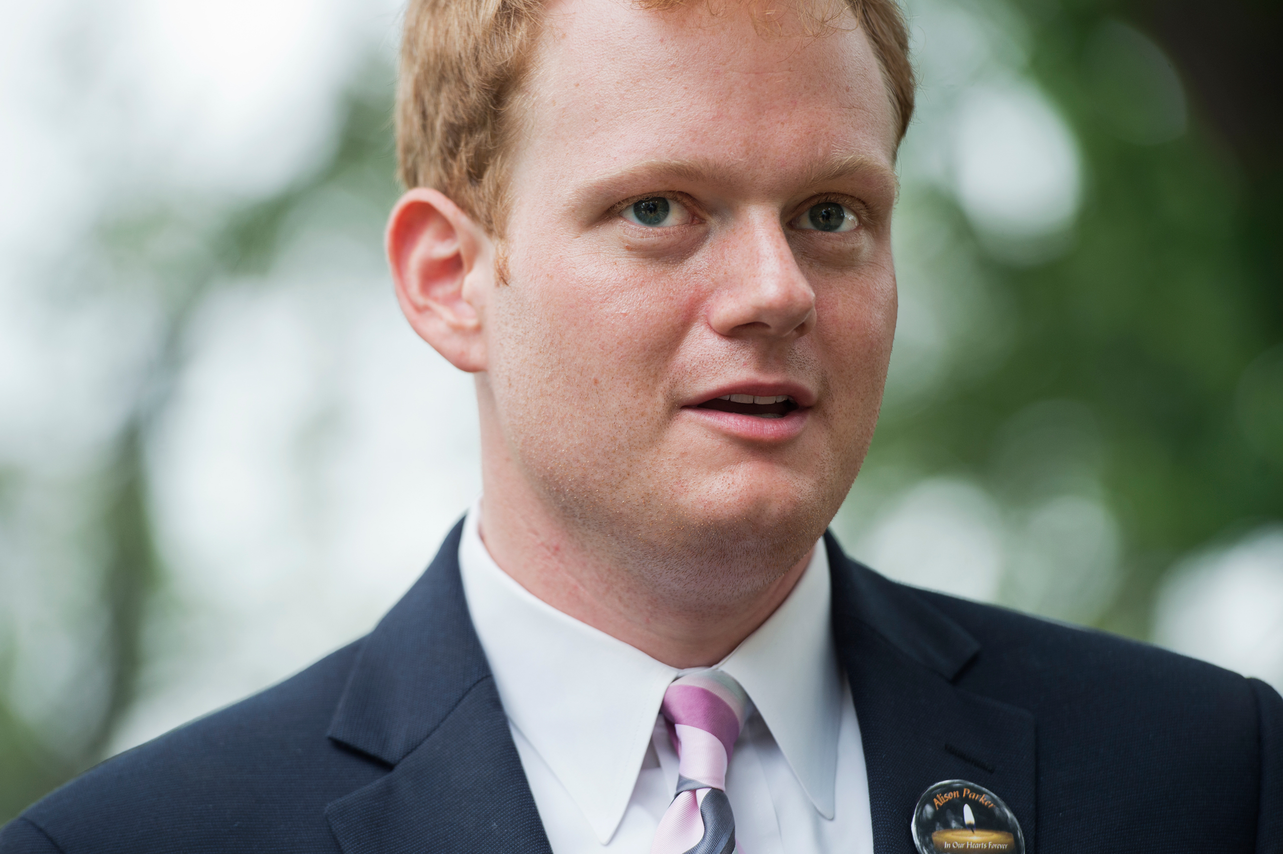 UNITED STATES - SEPTEMBER 10: Chris Hurst, whose girlfriend Alison Parker, a reporter for WDBJ-TV reporter, was killed on air last month, greets Gov. Terry McAuliffe, D-Va., during a rally on the East Front lawn of the Capitol to demand that Congress tak