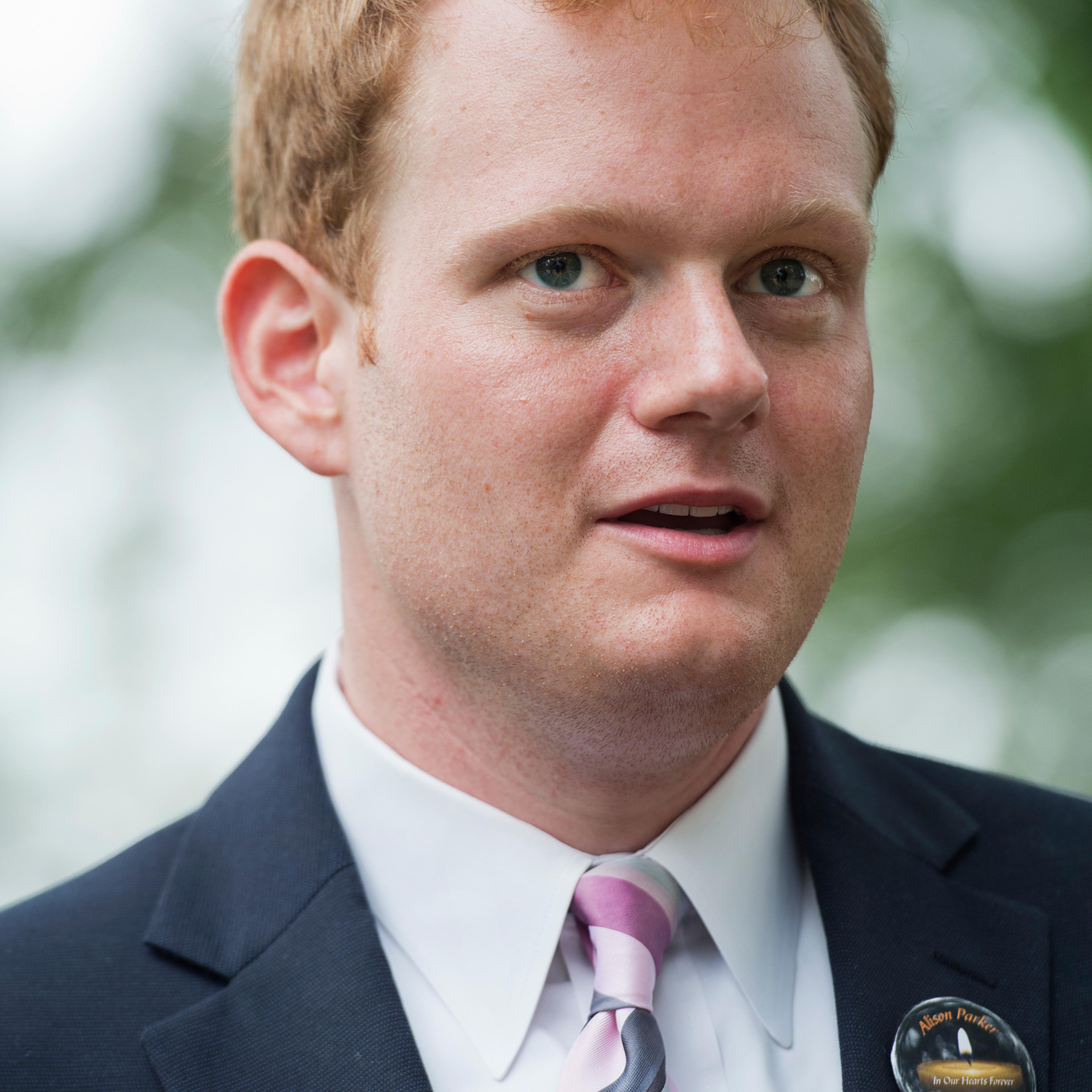 UNITED STATES - SEPTEMBER 10: Chris Hurst, whose girlfriend Alison Parker, a reporter for WDBJ-TV reporter, was killed on air last month, greets Gov. Terry McAuliffe, D-Va., during a rally on the East Front lawn of the Capitol to demand that Congress tak