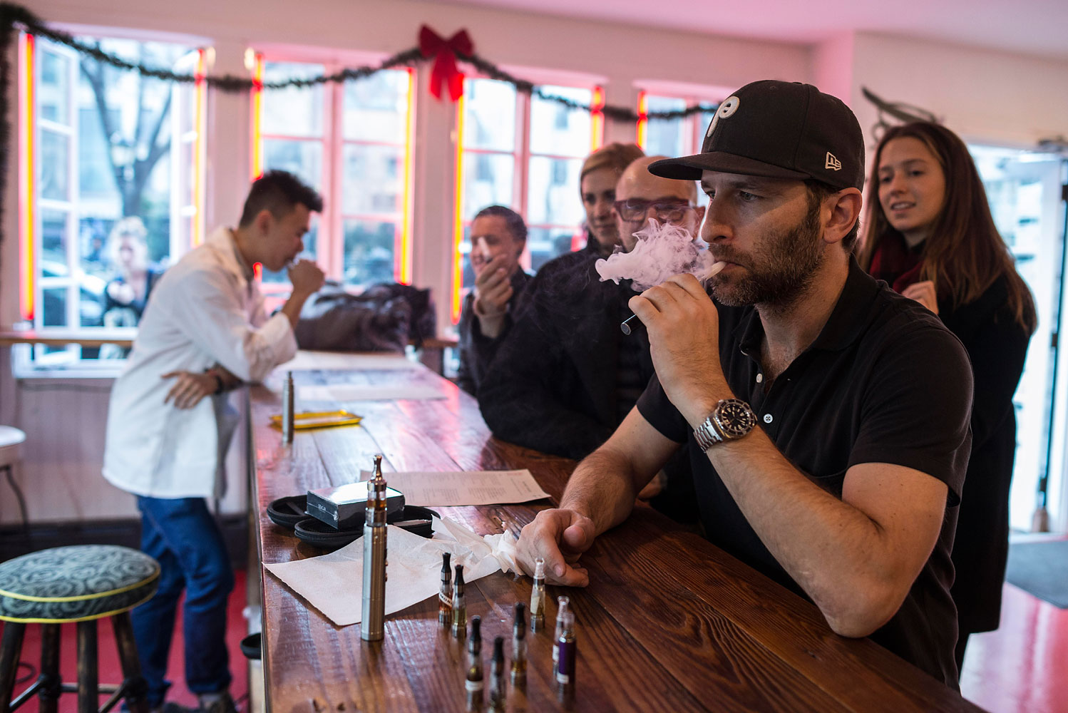 Customers at Henley Vaporium in New York, Dec. 2013.