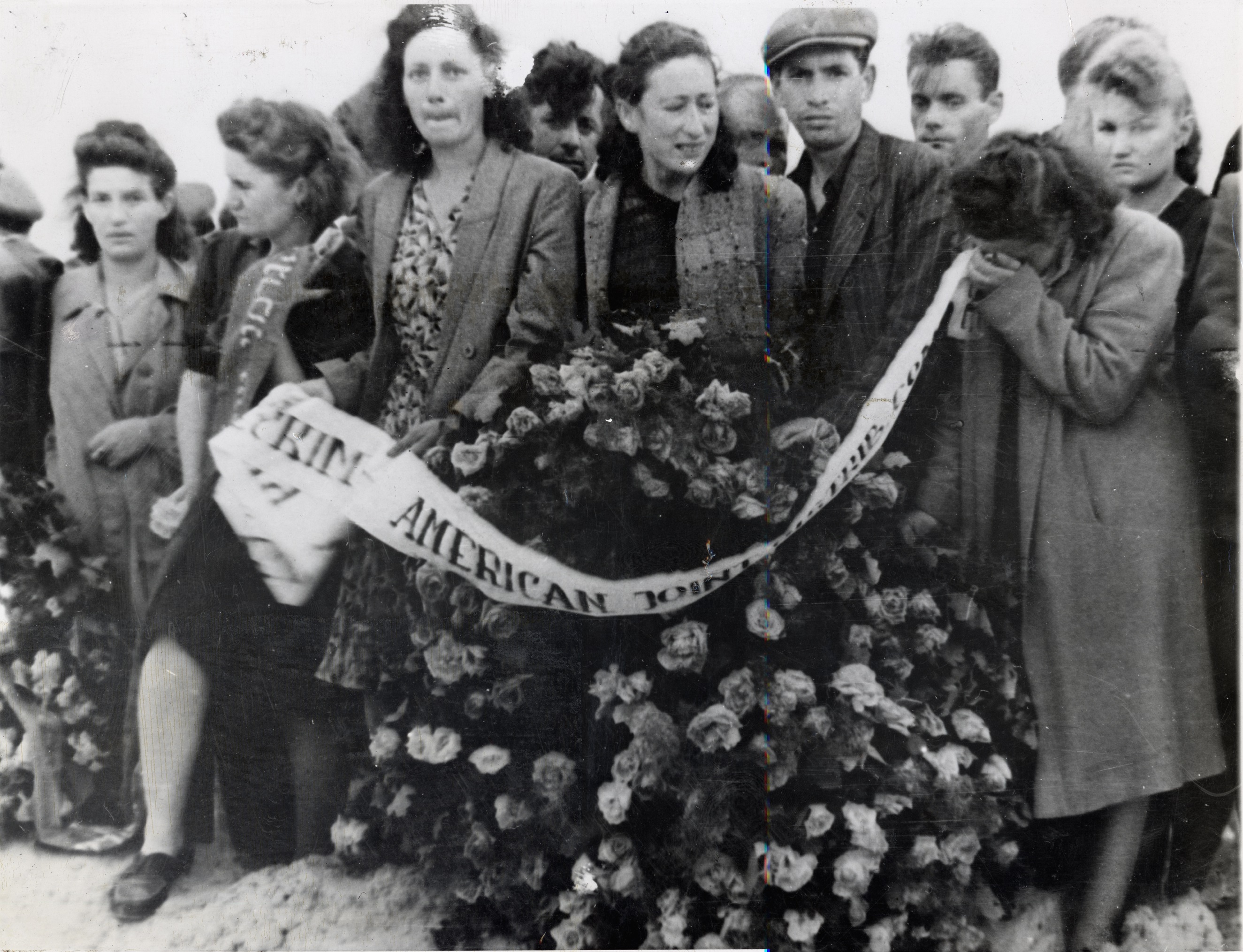 The Joint delegation at the funeral of victims of the Kielce pogrom, Poland, 1946. This pogrom, so soon after World War II, sparked the emigration of tens of thousands of Polish Jewish survivors immediately after the war. 