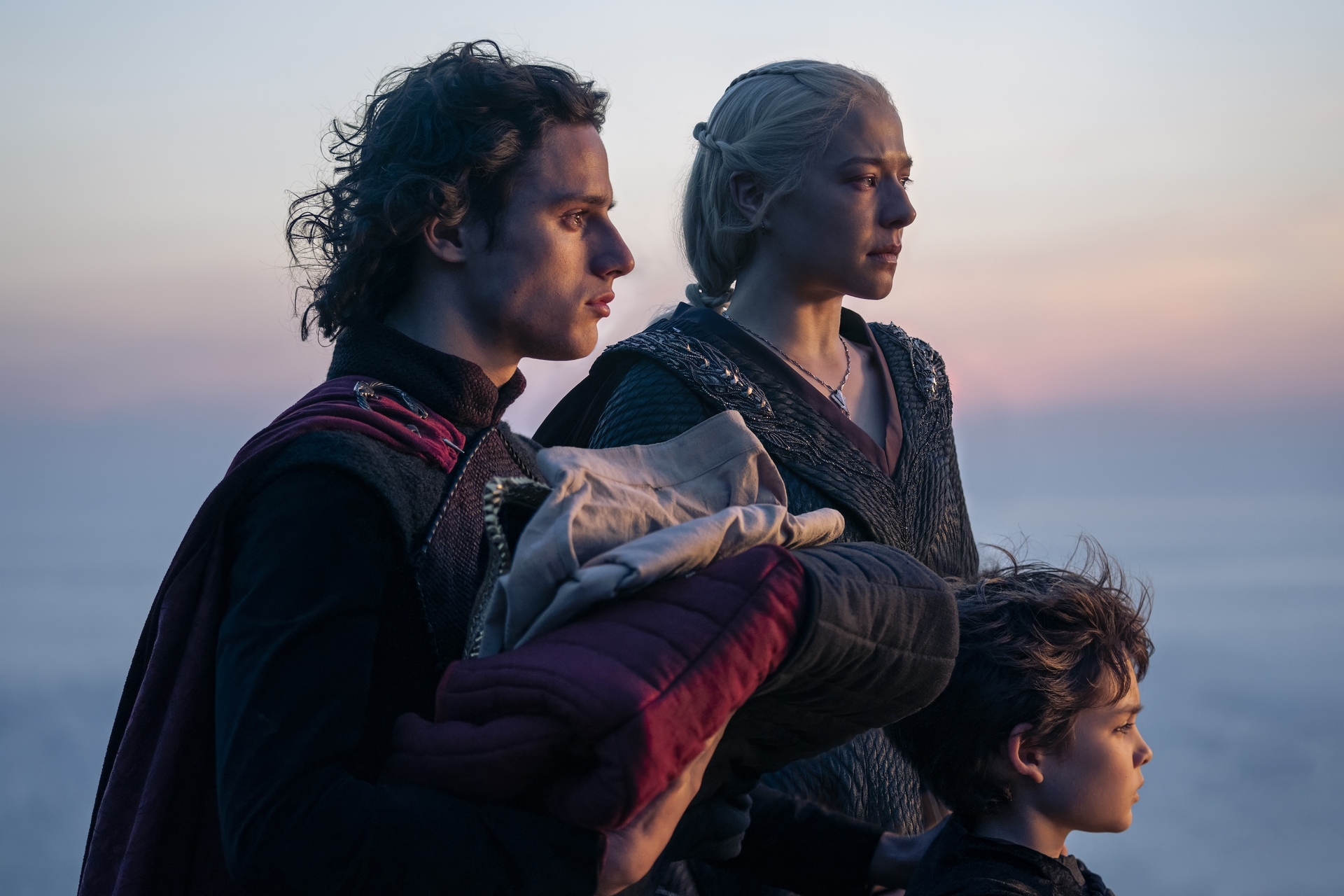 (L-R): Harry Collett as Jacaerys Velaryon, Emma D'Arcy as Rhaenyra Targaryen, and Oscar Eskinazi as Joffrey Velaryon in 'House of the Dragon' Season 2.
