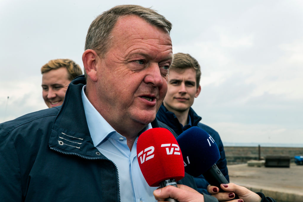 The forced departure of Danish Prime Minister Lars Lokke Rasmussen's son's American girlfriend has caused a debate about immigration laws.