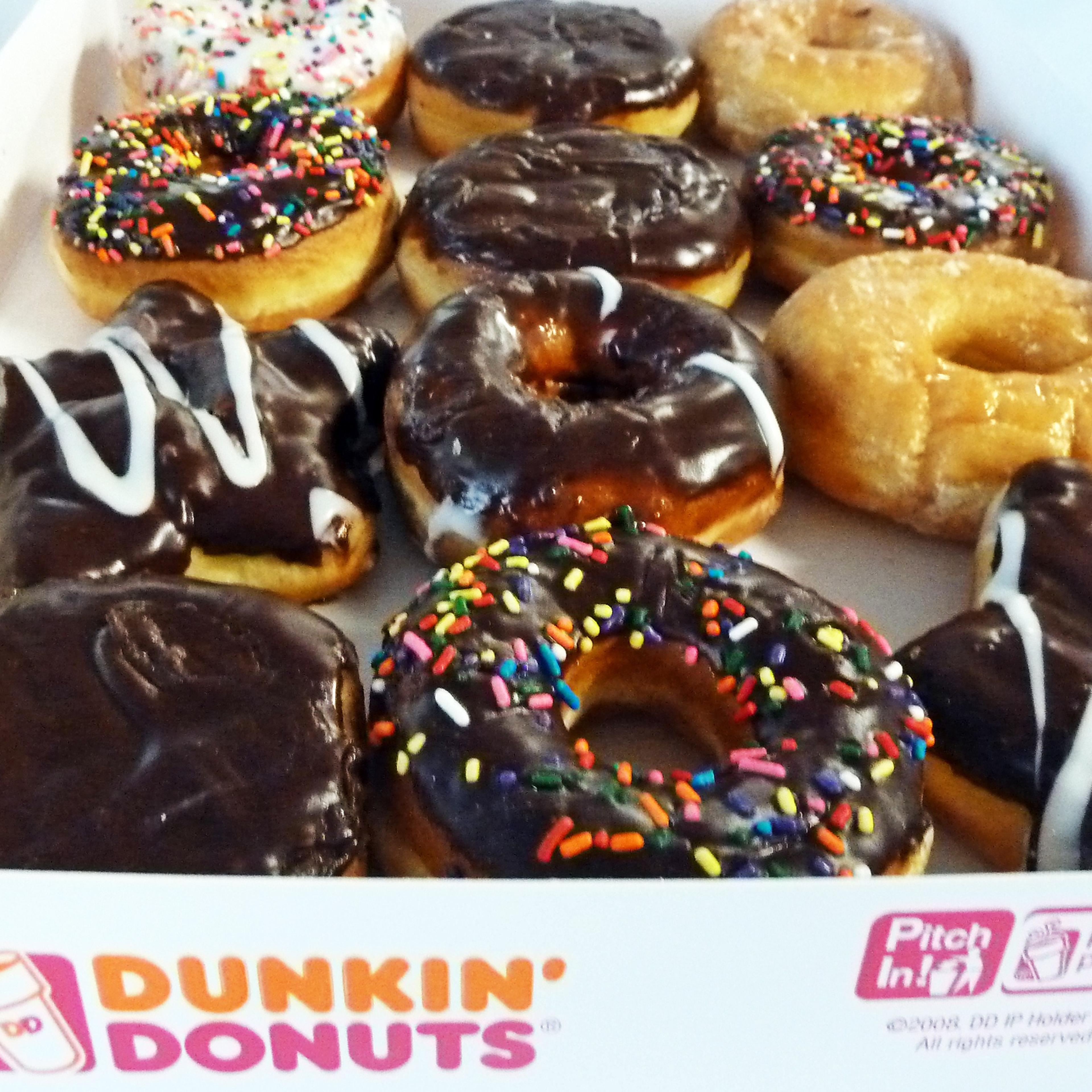 An assortment of Dunkin' Donuts seen in a paper box in Washington, DC June 5, 2015.