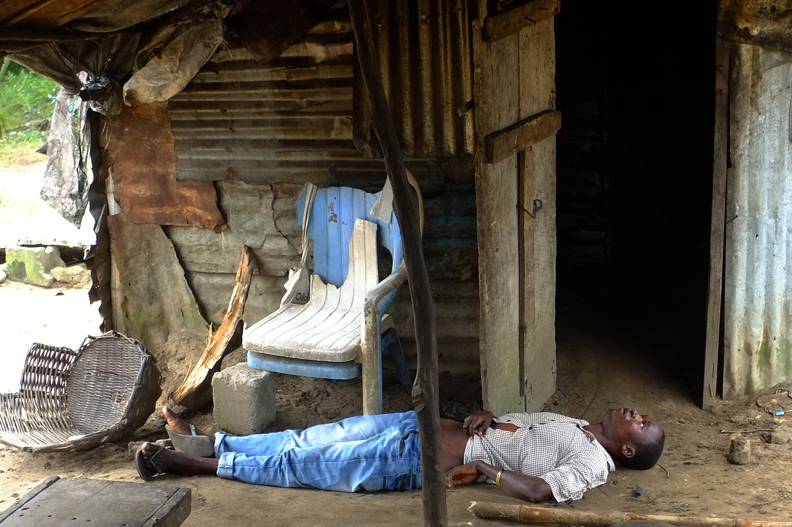 Dominique Faget, Aug. 26, 2014. Bandor, near Monrovia, Liberia. "I went with a team from the Liberian Red Cross to Bandor from Monrovia to pick up five dead people who had been infected with the Ebola virus. After photographing the removal of three bodie