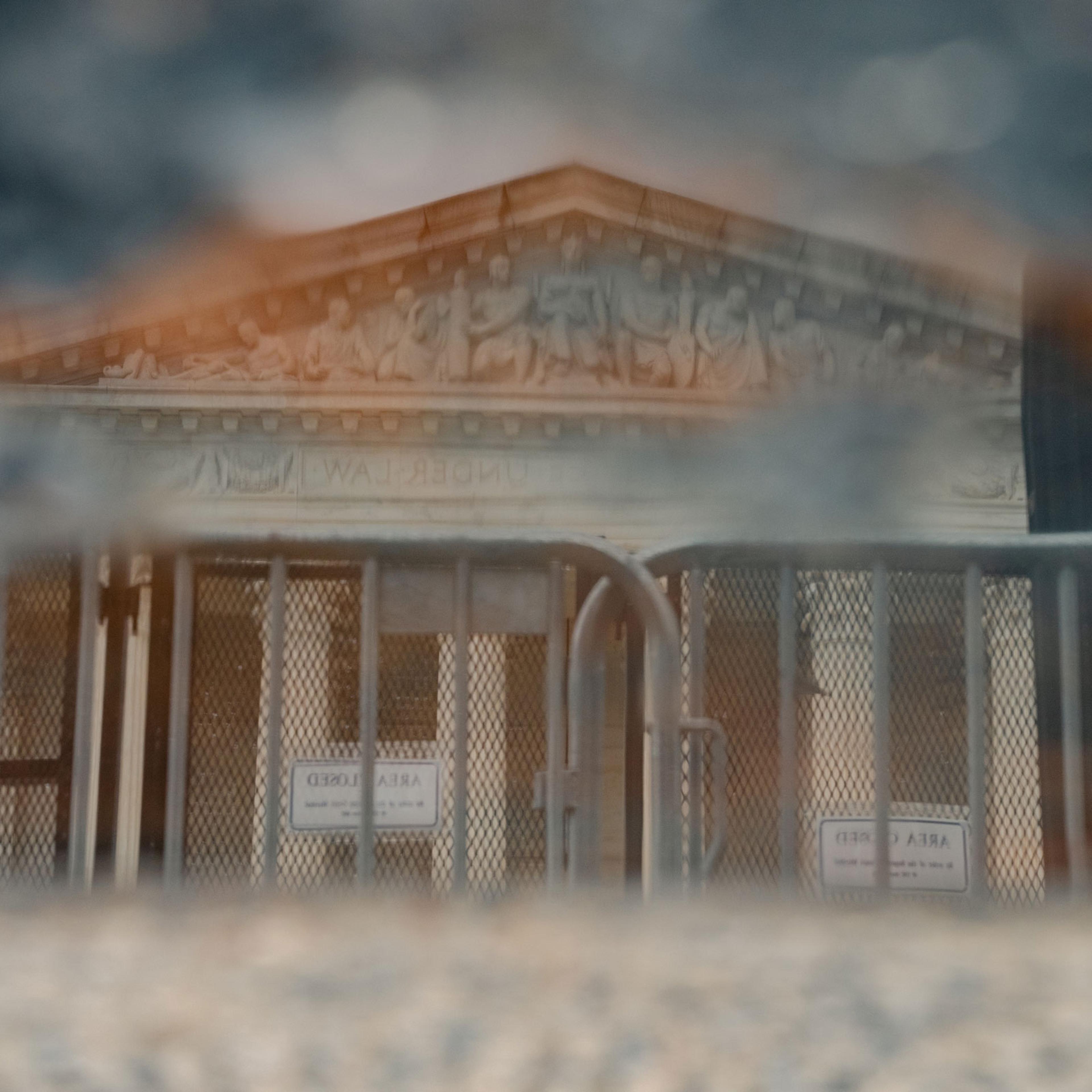 A reflection of the U.S. Supreme Court Building