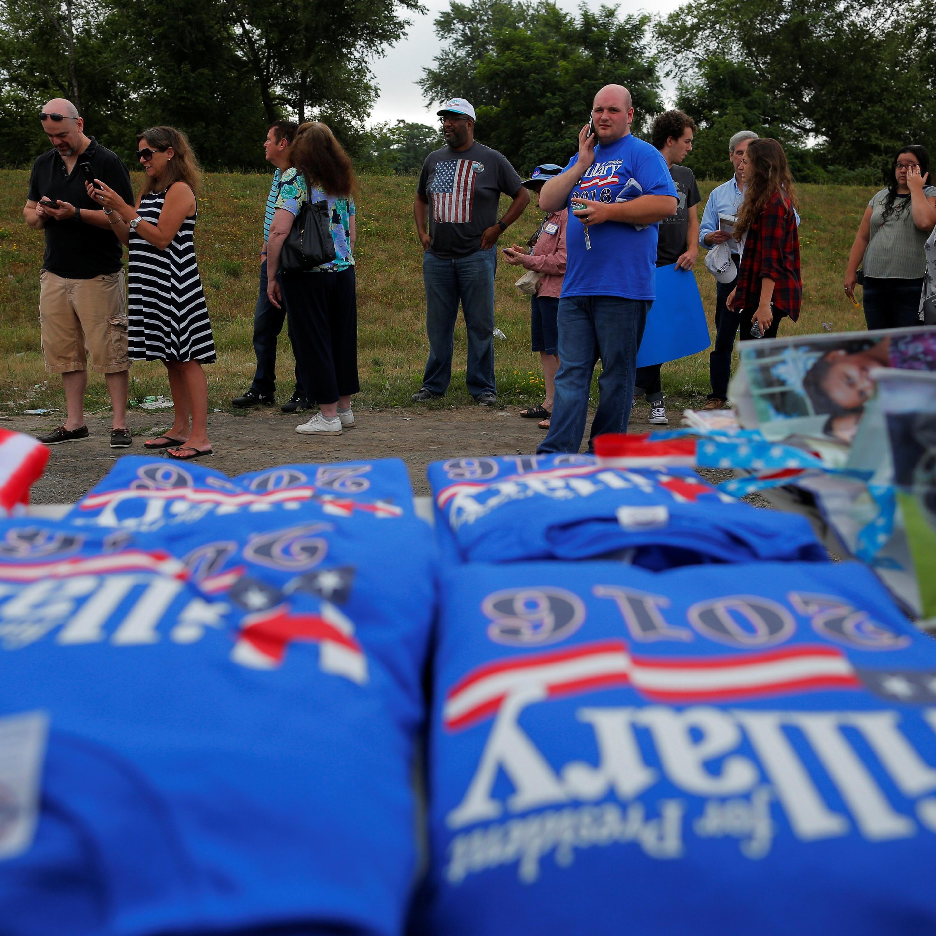 Guests wait in line before a campaign event with U.S. Democratic presidential candidate Hillary Clinton and U.S. Vice President Joe Biden in Scranton, Penns. on July 8, 2016, which was postponed "due to the tragic events in Dallas," according to the camp