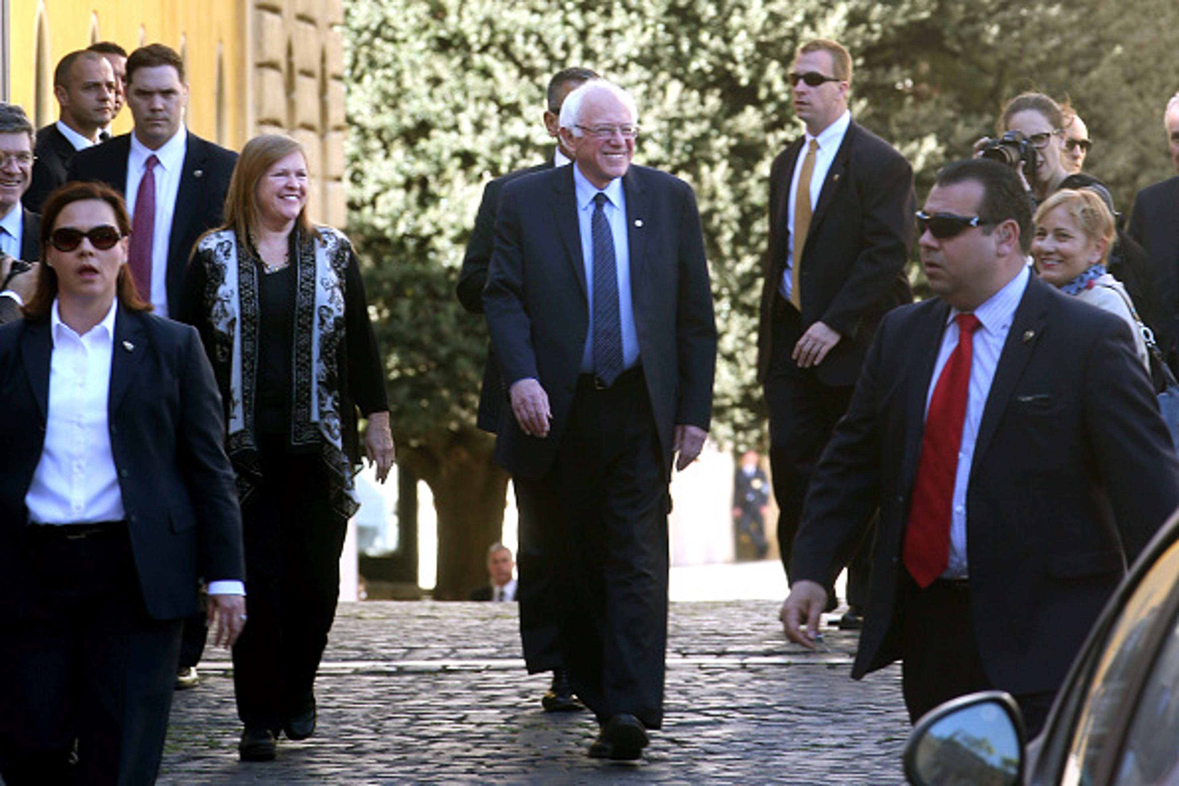 U.S. Democratic presidential canditate Bernie Sanders (C) leaves with his wife Jane O'Meara Sanders from the 'Centesimus Annus 25 Years Later Symposiumon' at the Casina Pio IV April 15, 2016 in Vatican City, Vatican.