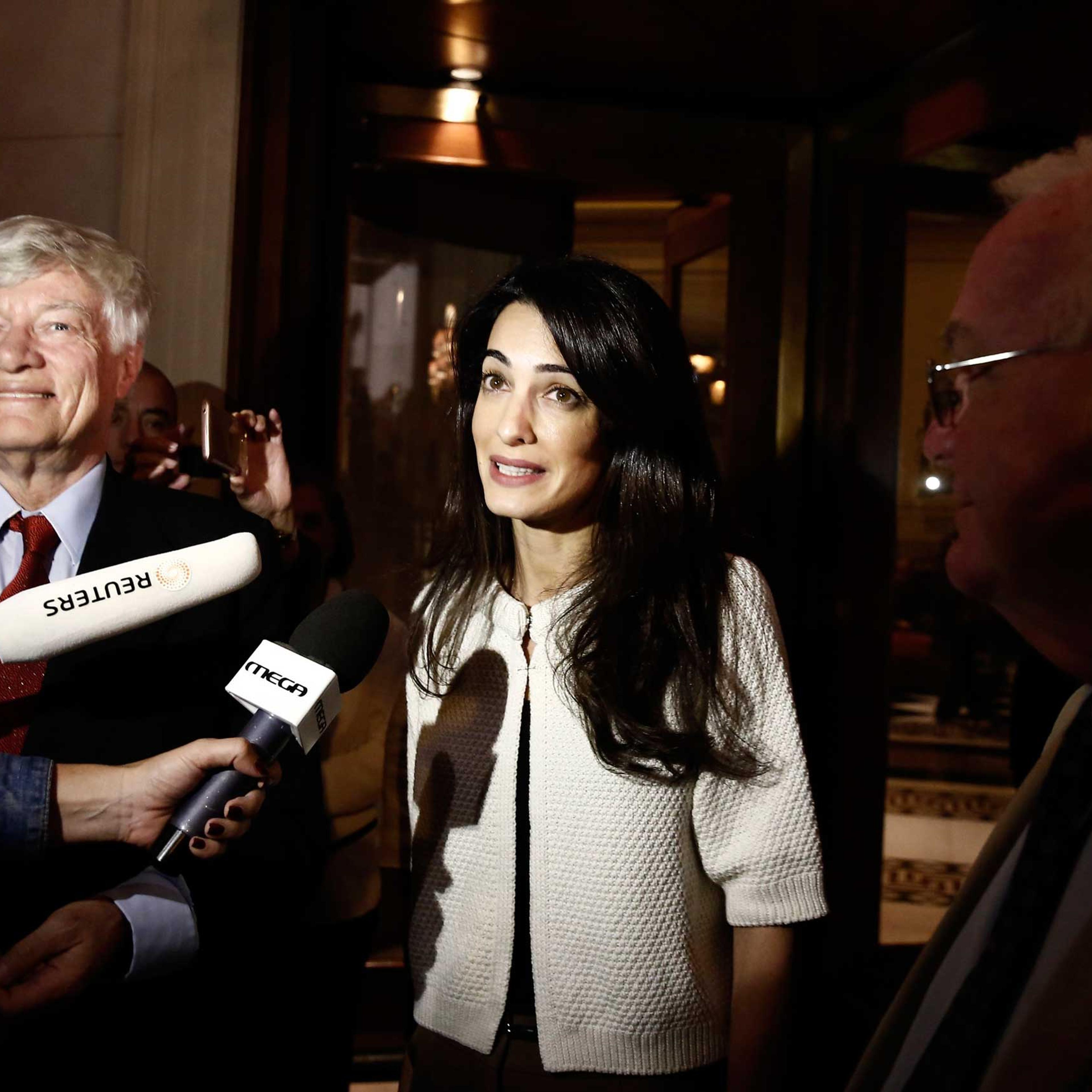 Human rights lawyer Amal Alamuddin Clooney speaks to media in Athens, Oct. 13, 2014.