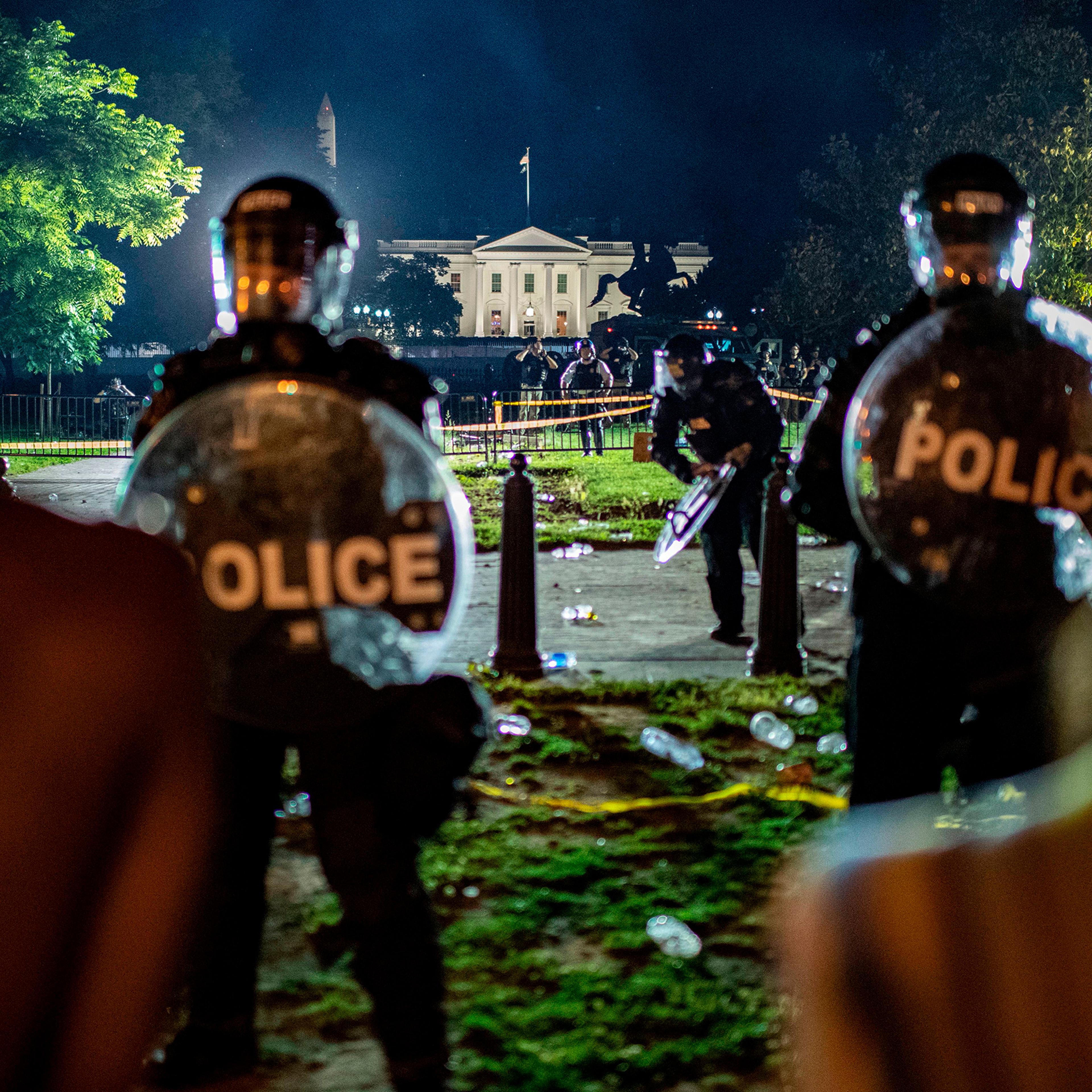 Demonstrators confront U.S. Secret Service and Park Police officers outside the White House in Washington, D.C., on May 30, 2020.