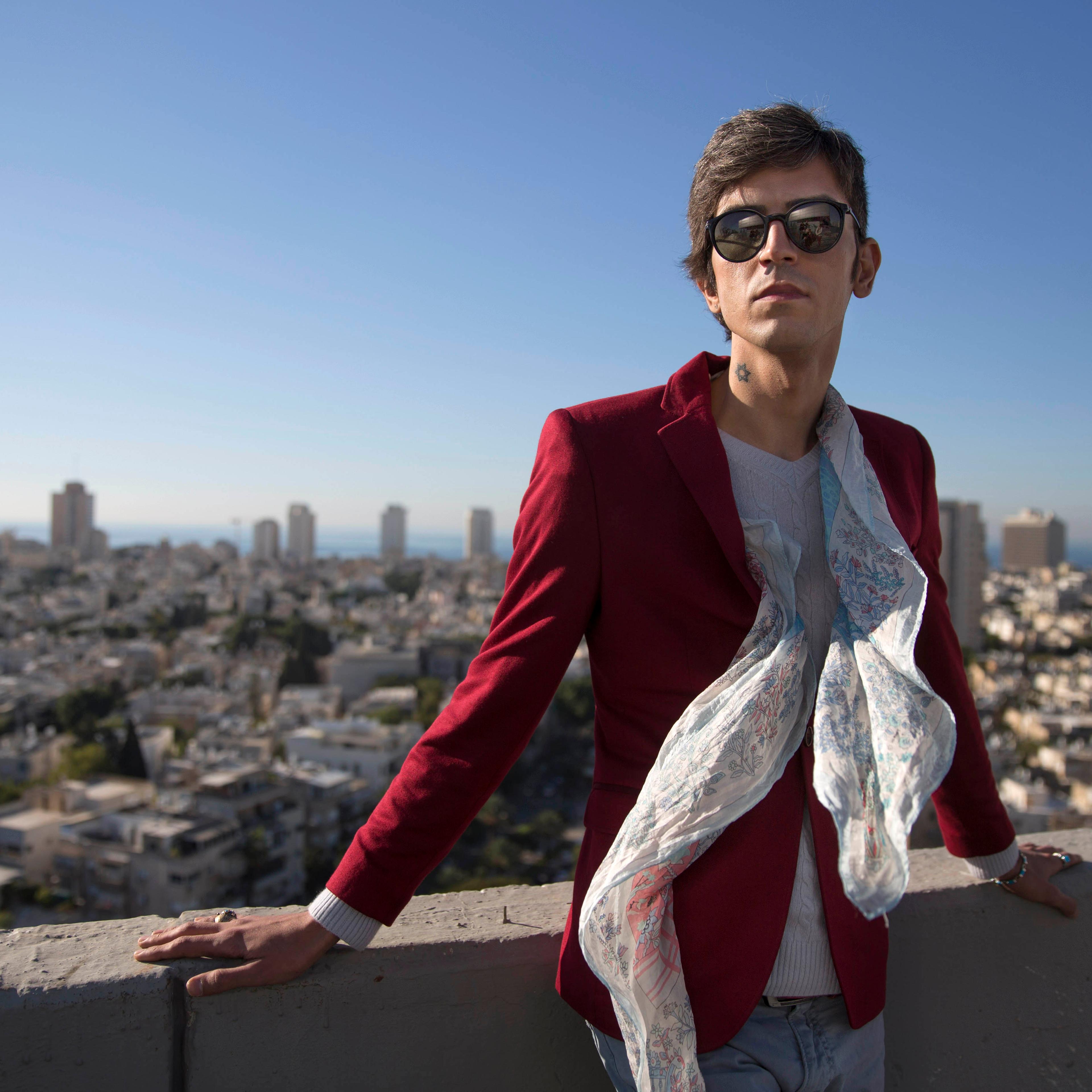 Iranian poet, Payam Feili poses for a photograph in Tel Aviv, Israel on Dec. 9, 2015.