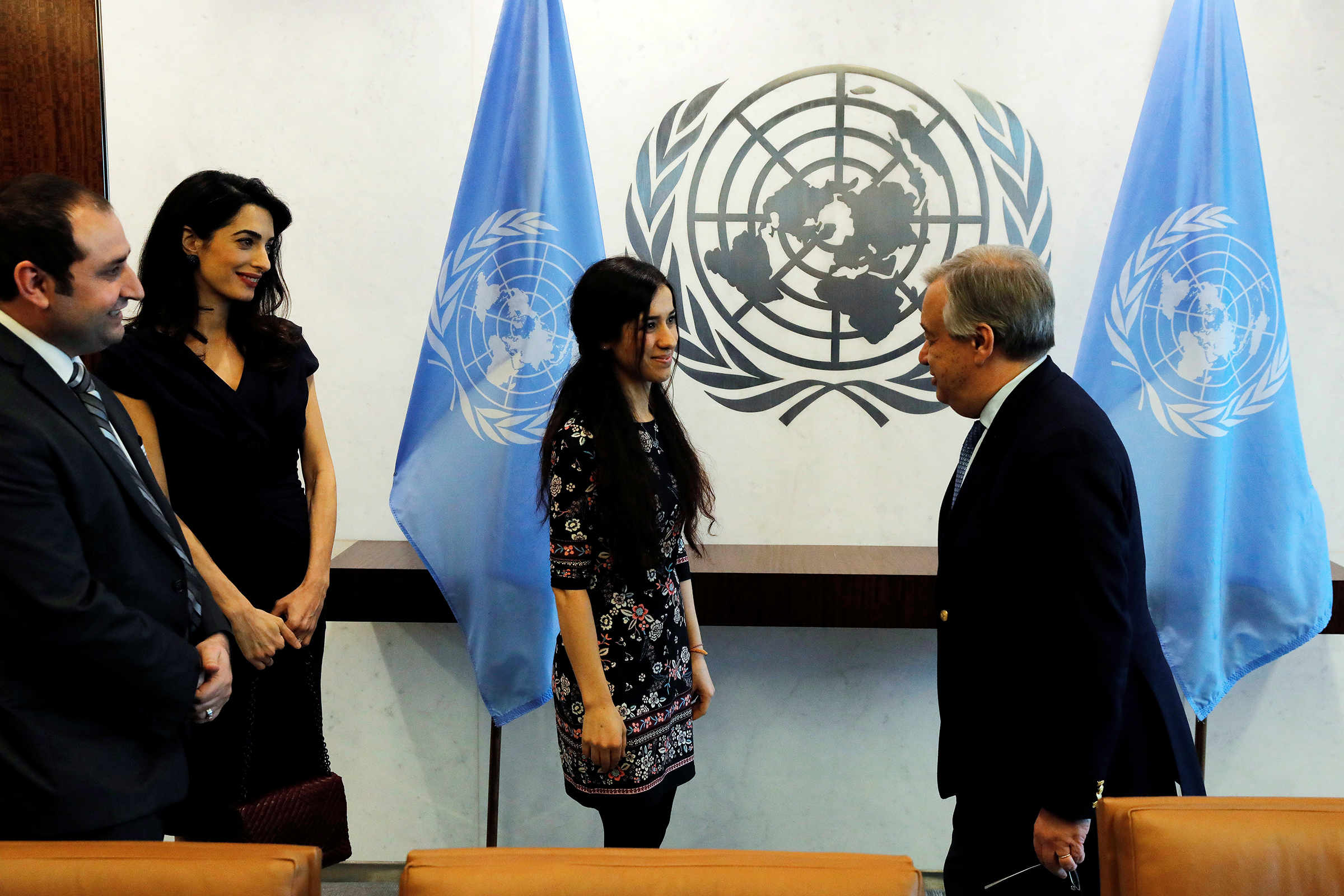 Clooney arrives at U.N. headquarters with Yezidi survivor Nadia Murad in March 2017