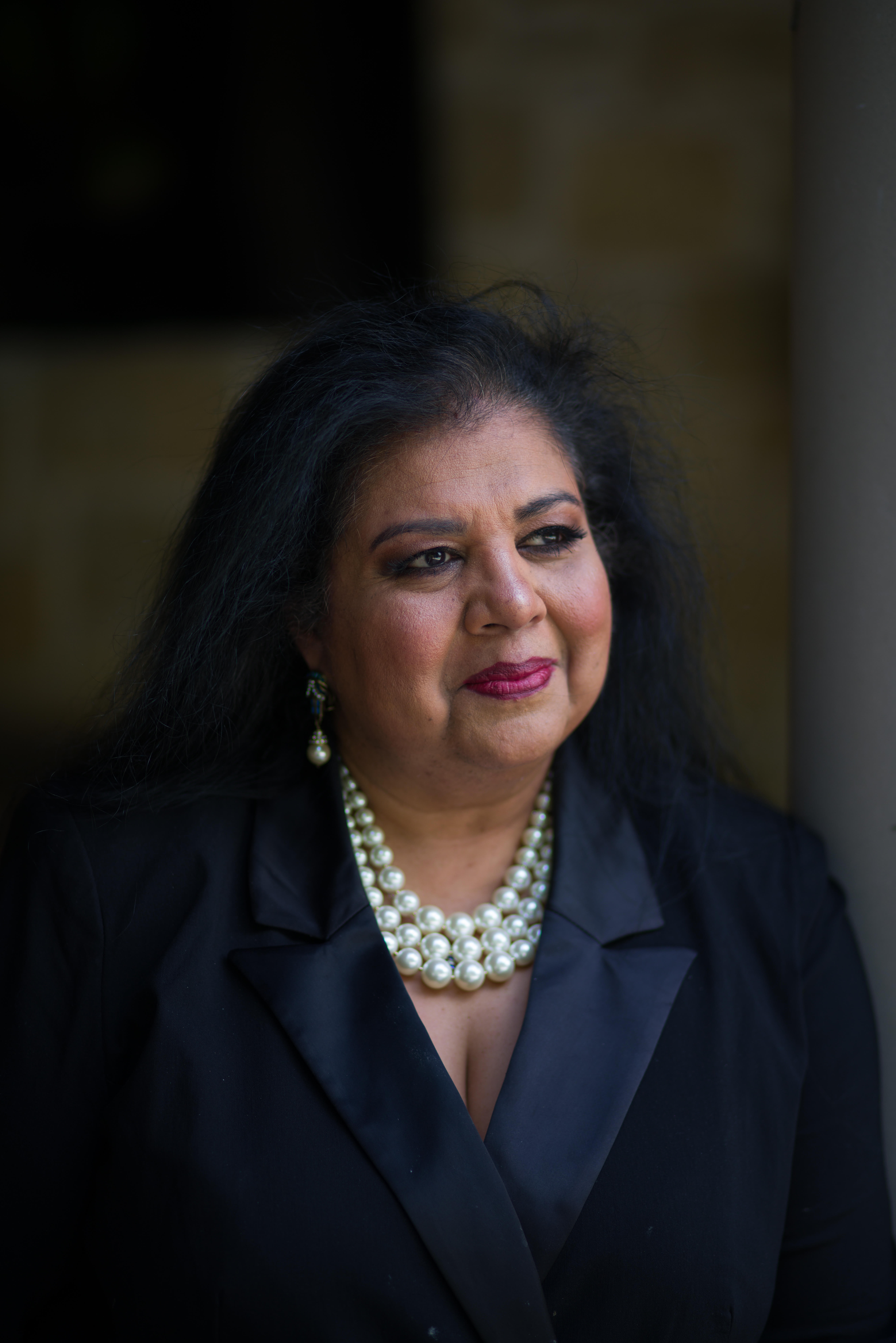 DALLAS - TX JULY 24: The CEO of Pernod Ricard North America Ann Mukherjee photographed in her back yard Dallas Texas.