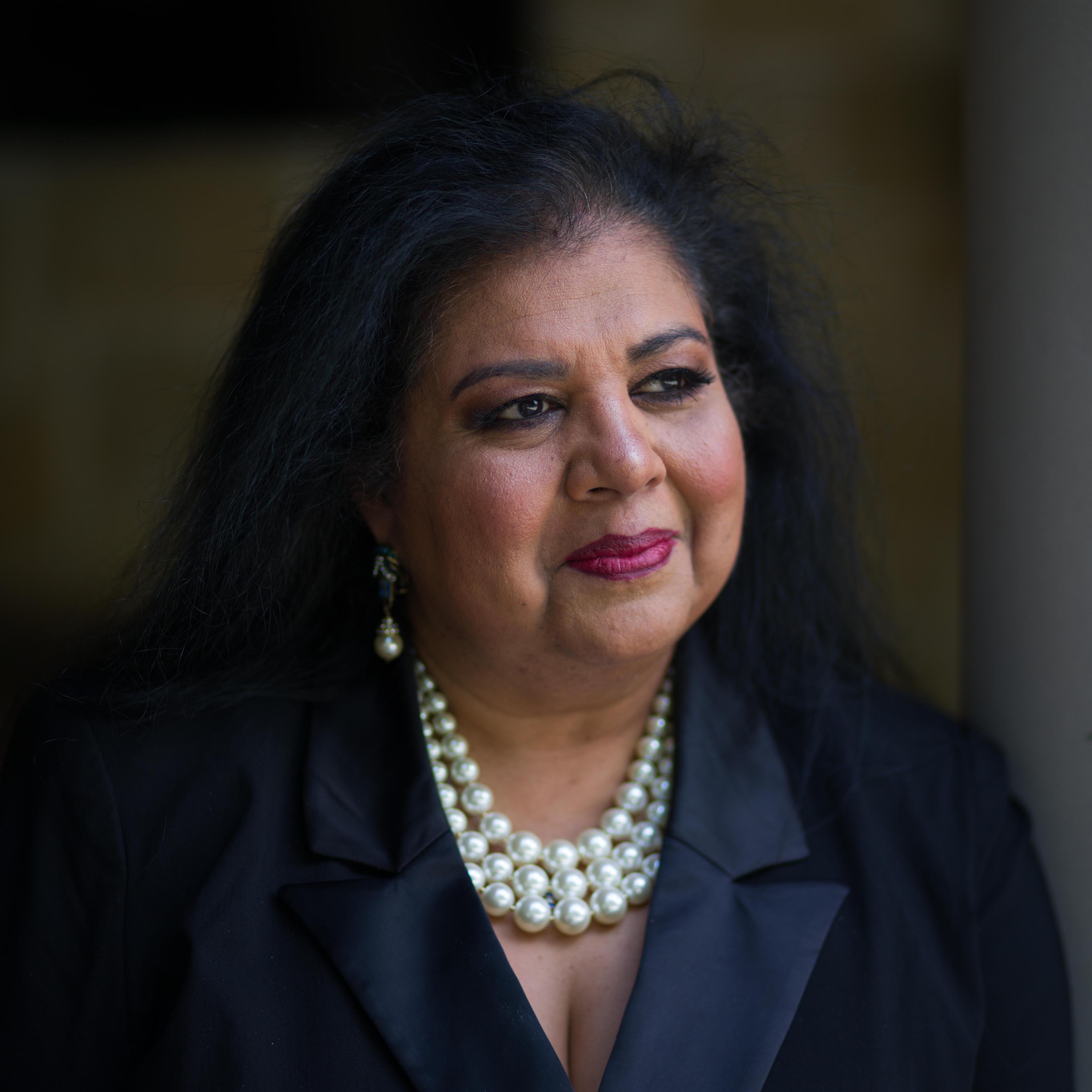 DALLAS - TX JULY 24: The CEO of Pernod Ricard North America Ann Mukherjee photographed in her back yard Dallas Texas.