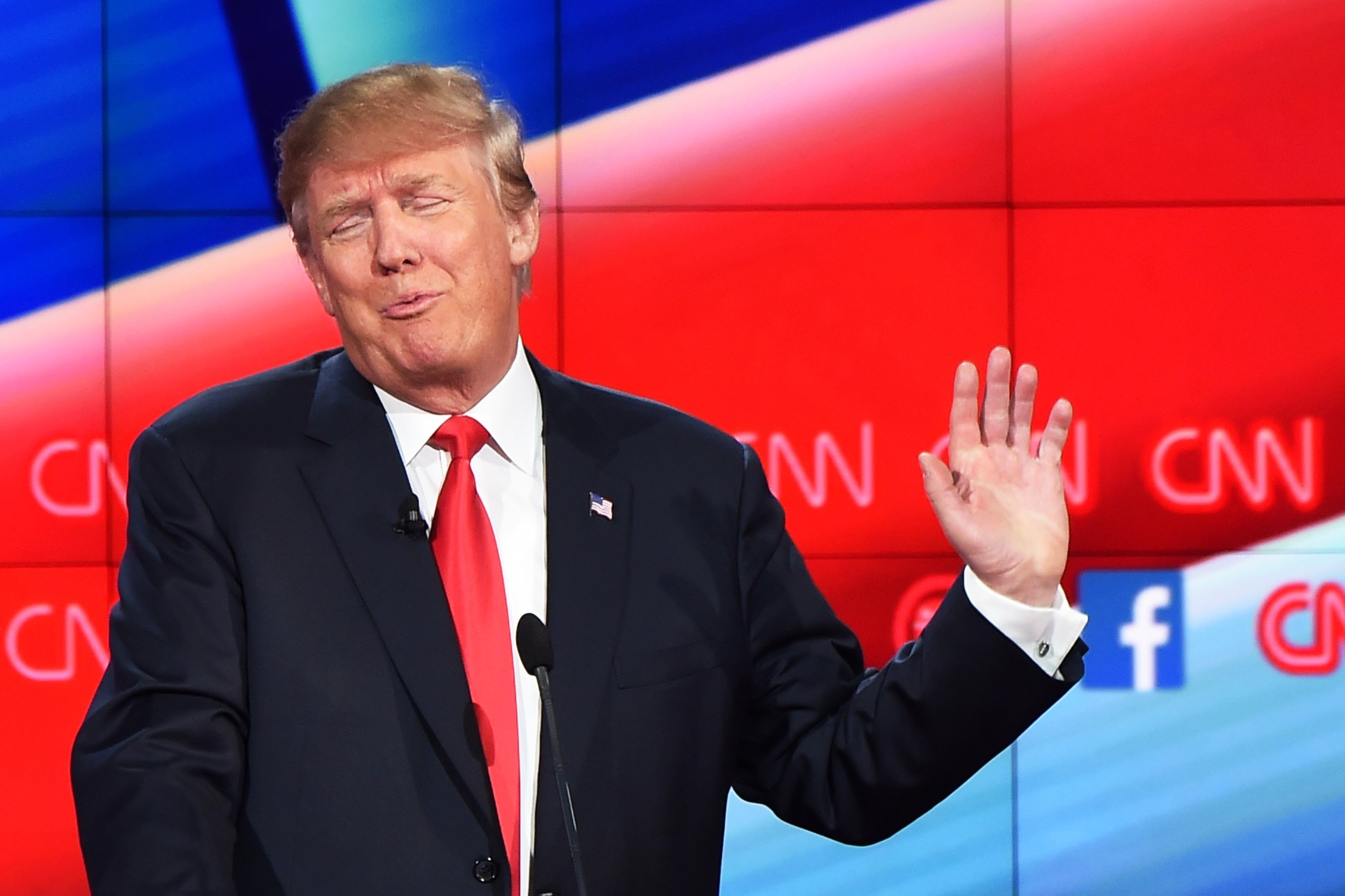 Republican presidential candidate, businessman Donald Trump, gestures during the Republican Presidential Debate on Dec. 15, 2015 in Las Vegas.
