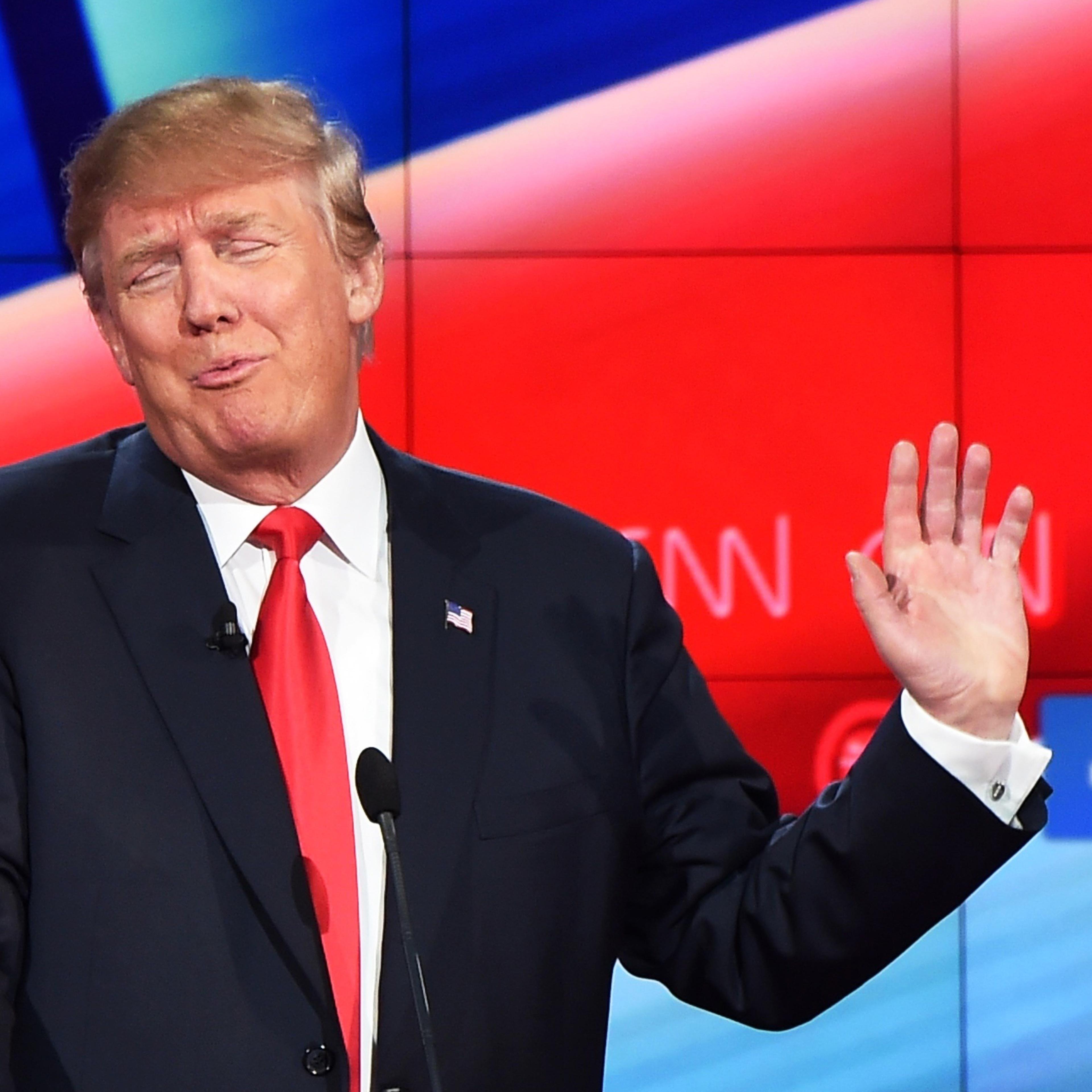 Republican presidential candidate, businessman Donald Trump, gestures during the Republican Presidential Debate on Dec. 15, 2015 in Las Vegas.