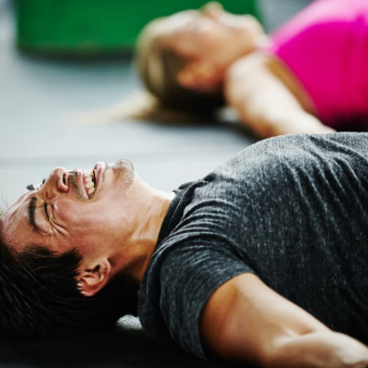 man-lying-gym