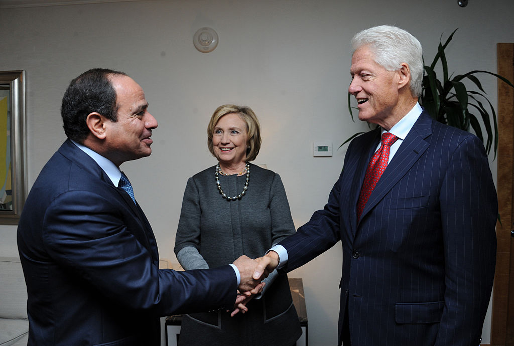 Egyptian President Abdel Fattah el-Sisi (L), being in United States for the 69th Session of the UN General Assembly (UNGA 69), meets with Former U.S. President Bill Clinton (R) and former US Secretary of State Hillary Clinton (C), in New York on Sept. 22