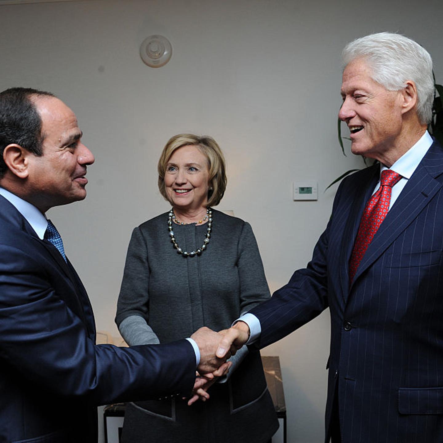 Egyptian President Abdel Fattah el-Sisi (L), being in United States for the 69th Session of the UN General Assembly (UNGA 69), meets with Former U.S. President Bill Clinton (R) and former US Secretary of State Hillary Clinton (C), in New York on Sept. 22