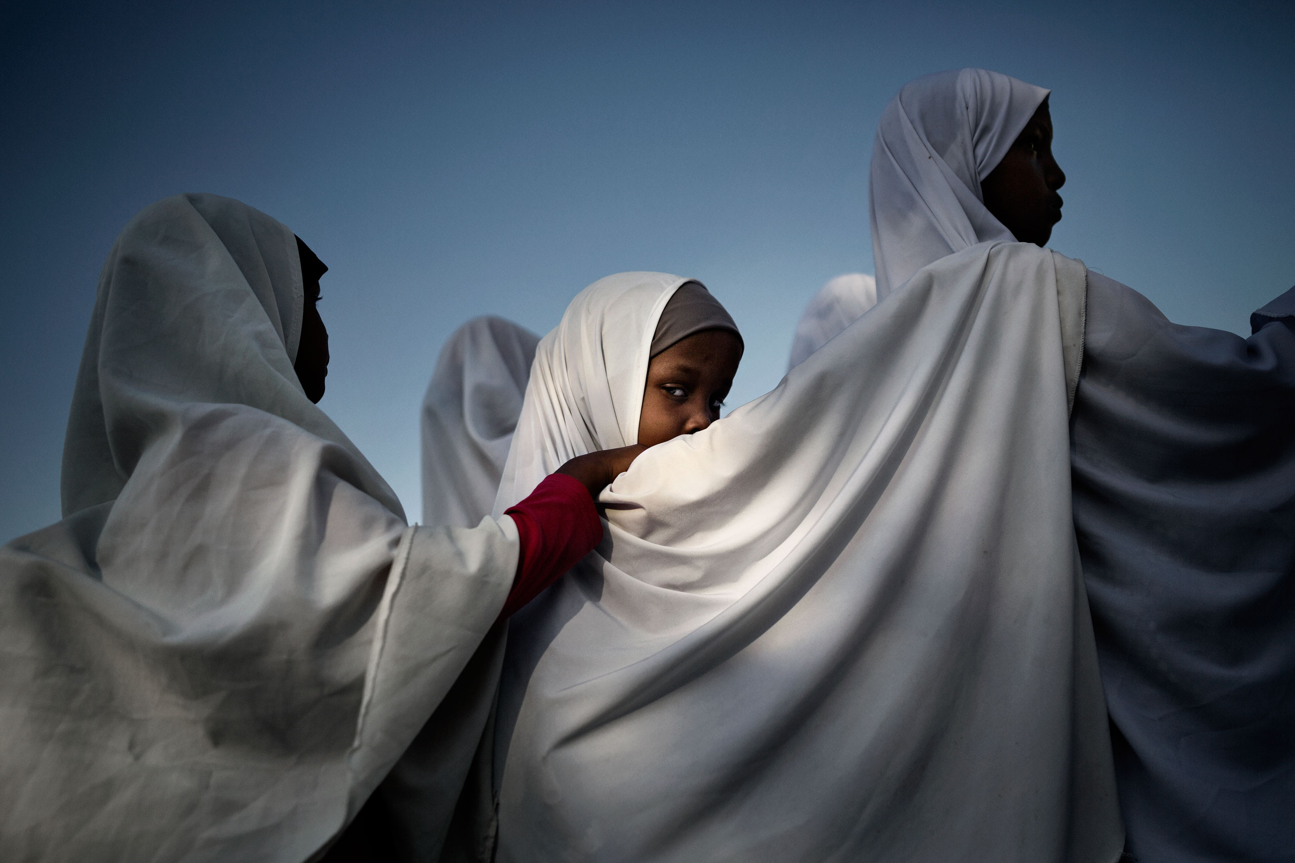 Female students in the courtyard of the Haji Mire Primary School in Bosaso, Somalia. The school has nine classes and students are taught English, Arabic, Math, Physics and they also study the Koran. October 6, 2015.