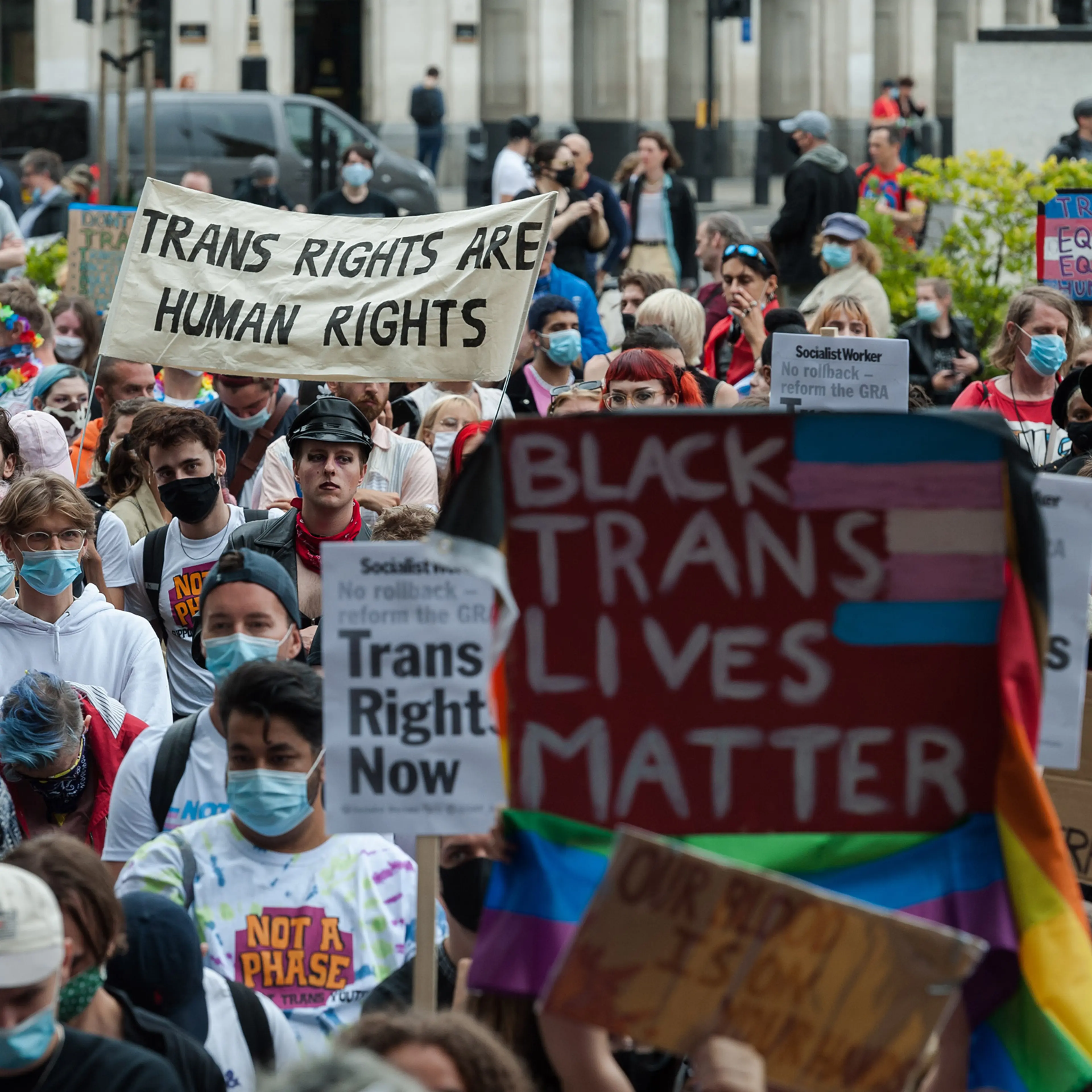 Transgender people and their supporters gather in Parliament Square to protest against potential changes to the Gender Recognition Act on July 4 in London