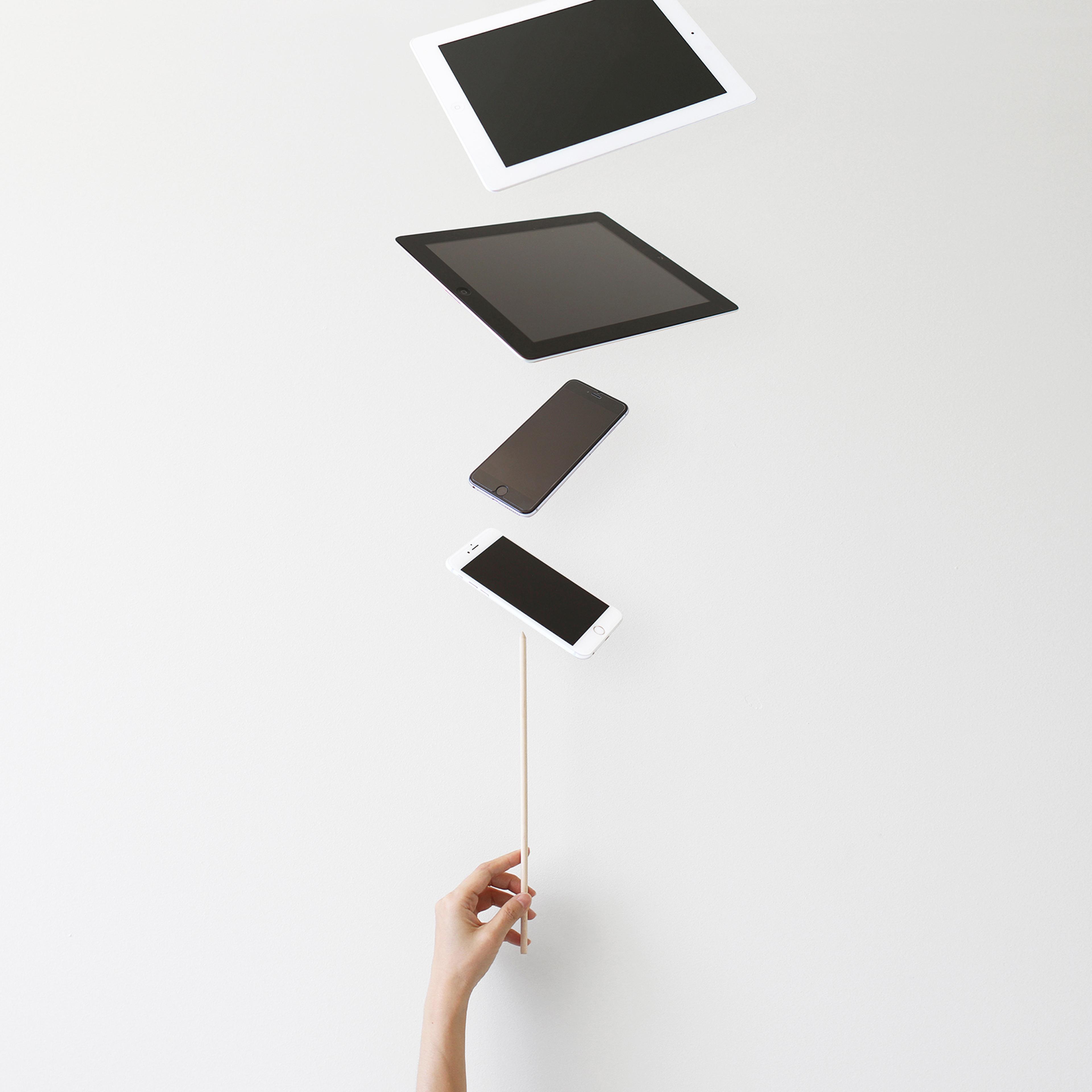 balancing work career home cellphone tablet goals motto stock