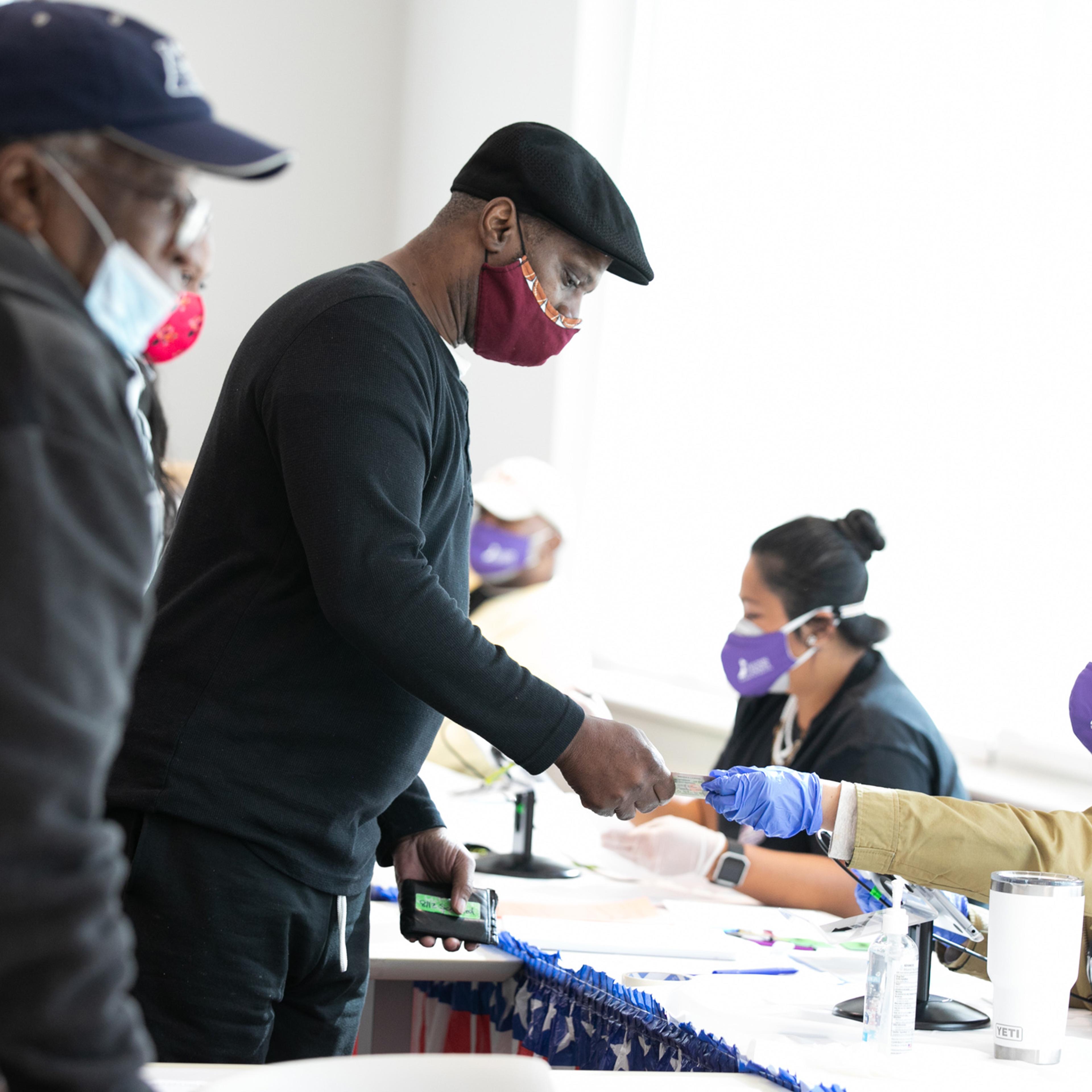 Across The U.S. Voters Flock To The Polls On Election Day