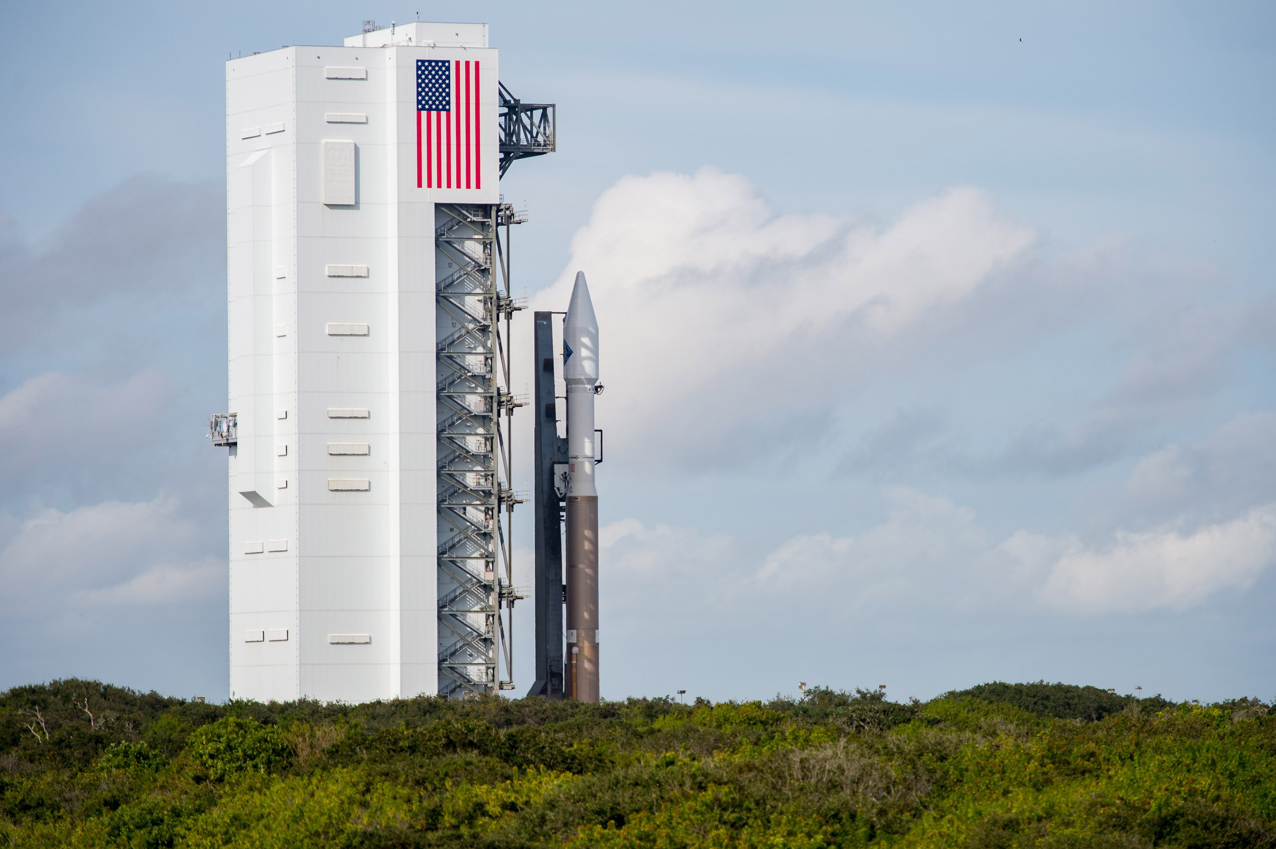 The United Launch Alliance Atlas V rocket with Orbital ATKs Cygnus spacecraft onboard is seen shortly after Launch Complex 41 Vertical Integration Facility on December 2, 2015, at the Cape Canaveral Air Force Station in Florida. Orbital ATK on December 2