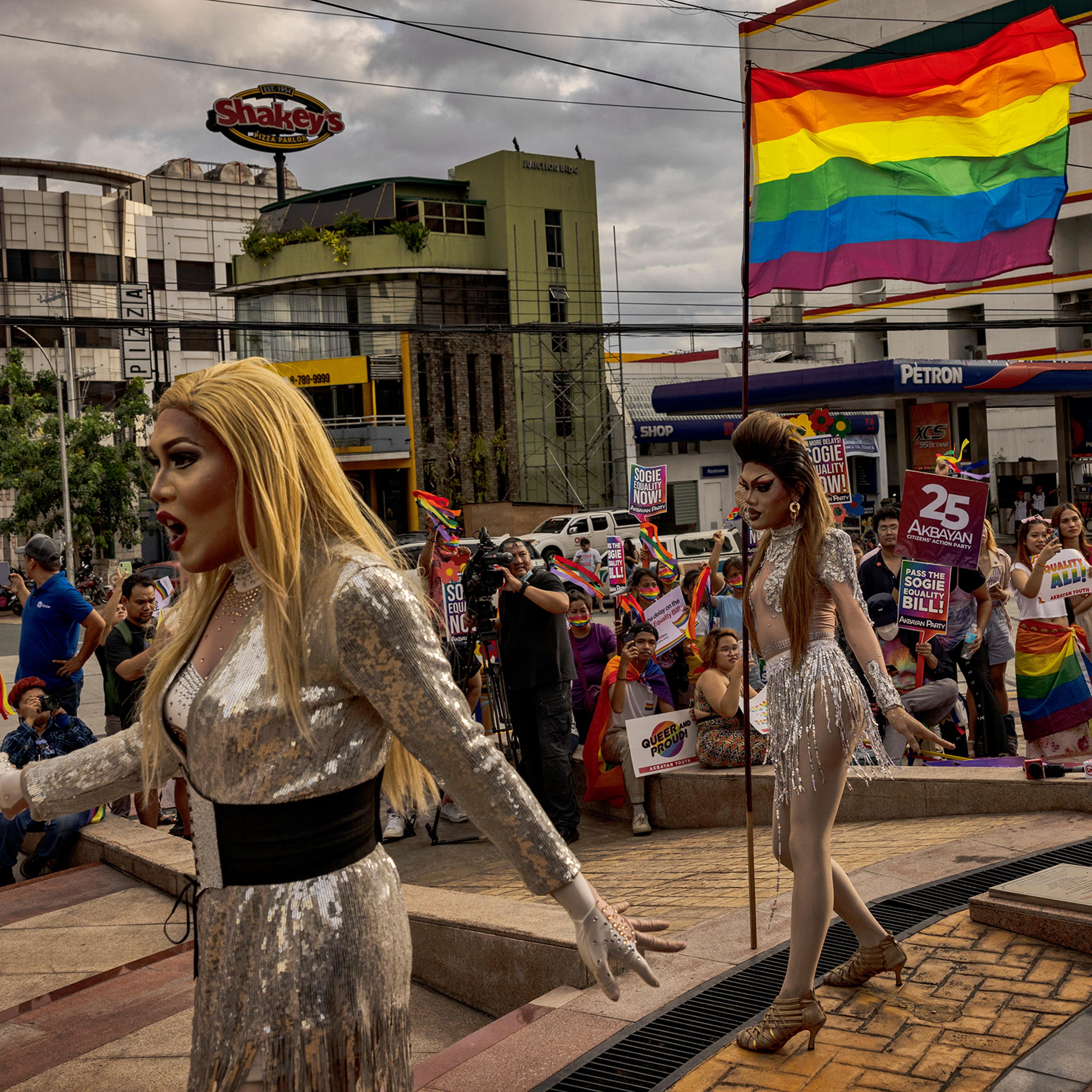 Drag queens Lumina Klum and Mrs. Tan perform as activists take part in a protest to kick off Pride month in Quezon City, Metro Manila, Philippines, June 2, 2023.