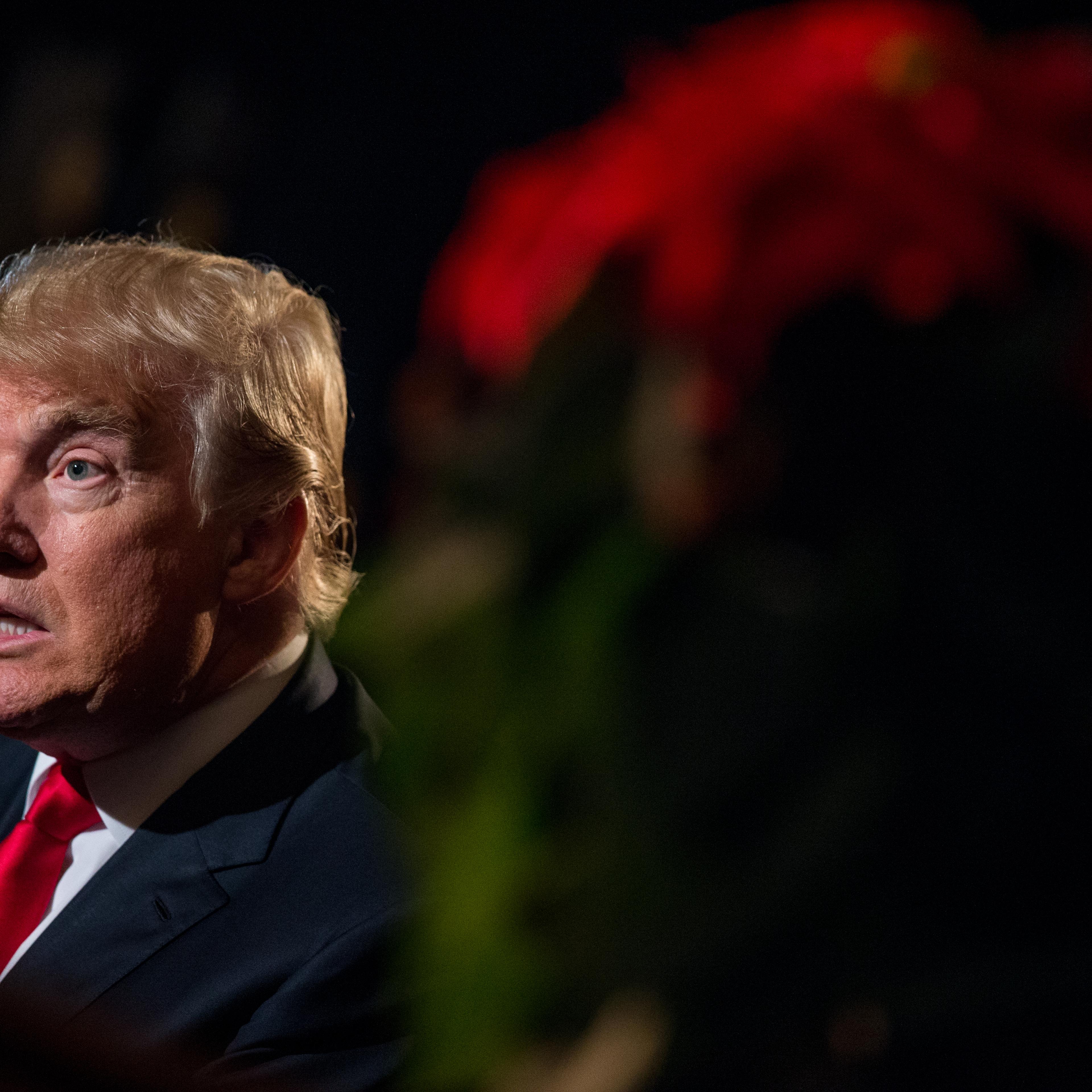 Republican presidential candidate Donald Trump speaks during an interview with the Associated Press at the Trump National Golf Club in Sterling, Va. on Dec. 2, 2015.
