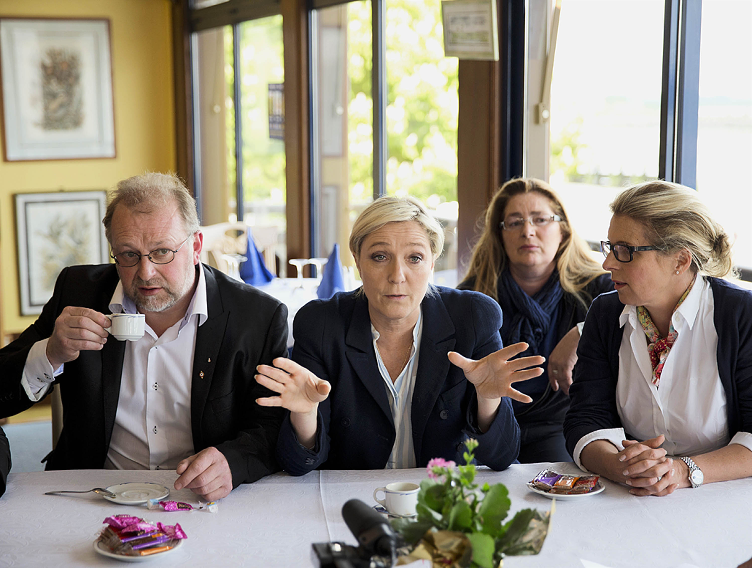 Marine Le Pen meets with the press after doing a walk through of the town of  Abbeville, France , April 28th, 2014.  Marine Le Pen is a French political leader, lawyer by profession, a French politician and the president of the far-right Front National, 