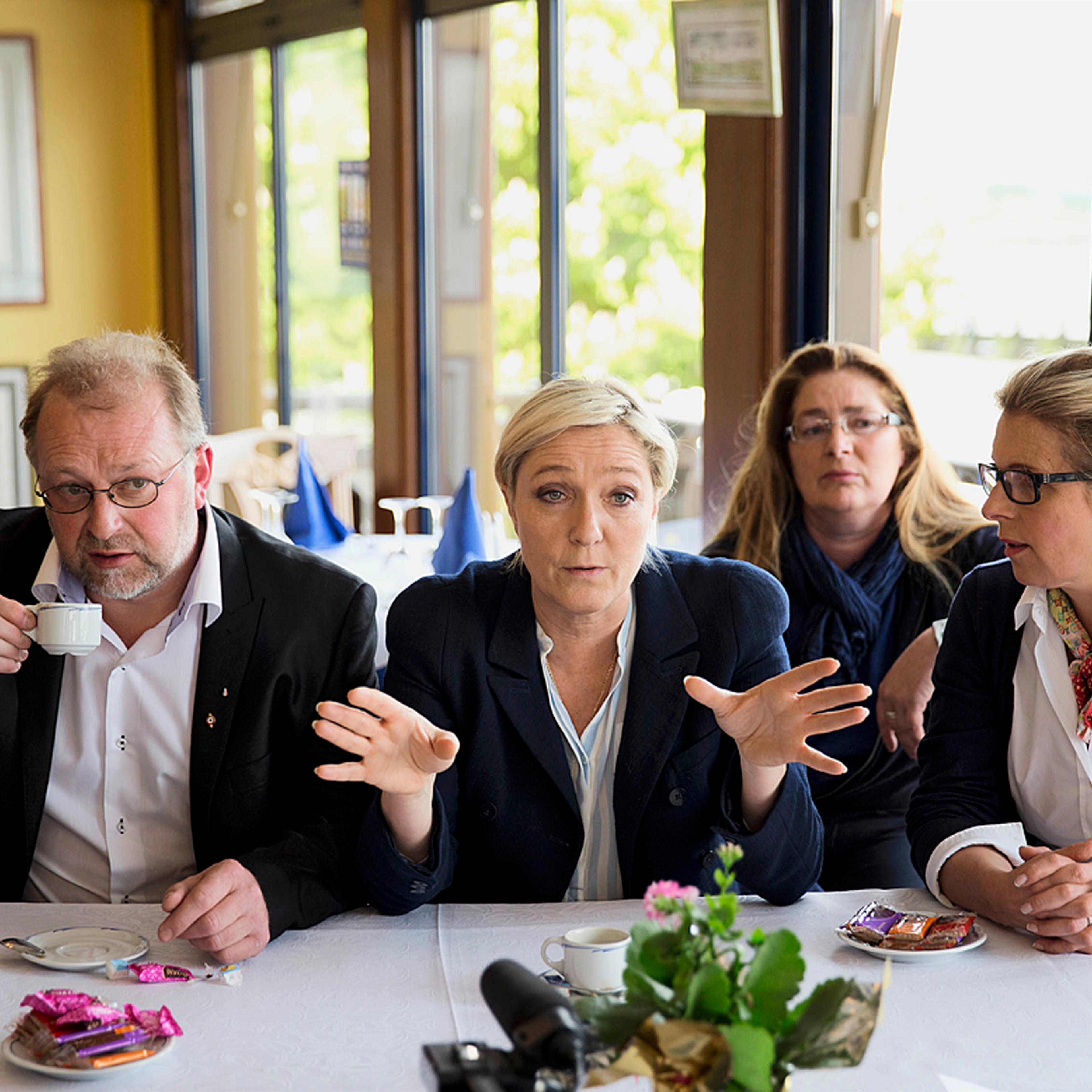 Marine Le Pen meets with the press after doing a walk through of the town of Abbeville, France , April 28th, 2014. Marine Le Pen is a French political leader, lawyer by profession, a French politician and the president of the far-right Front National,