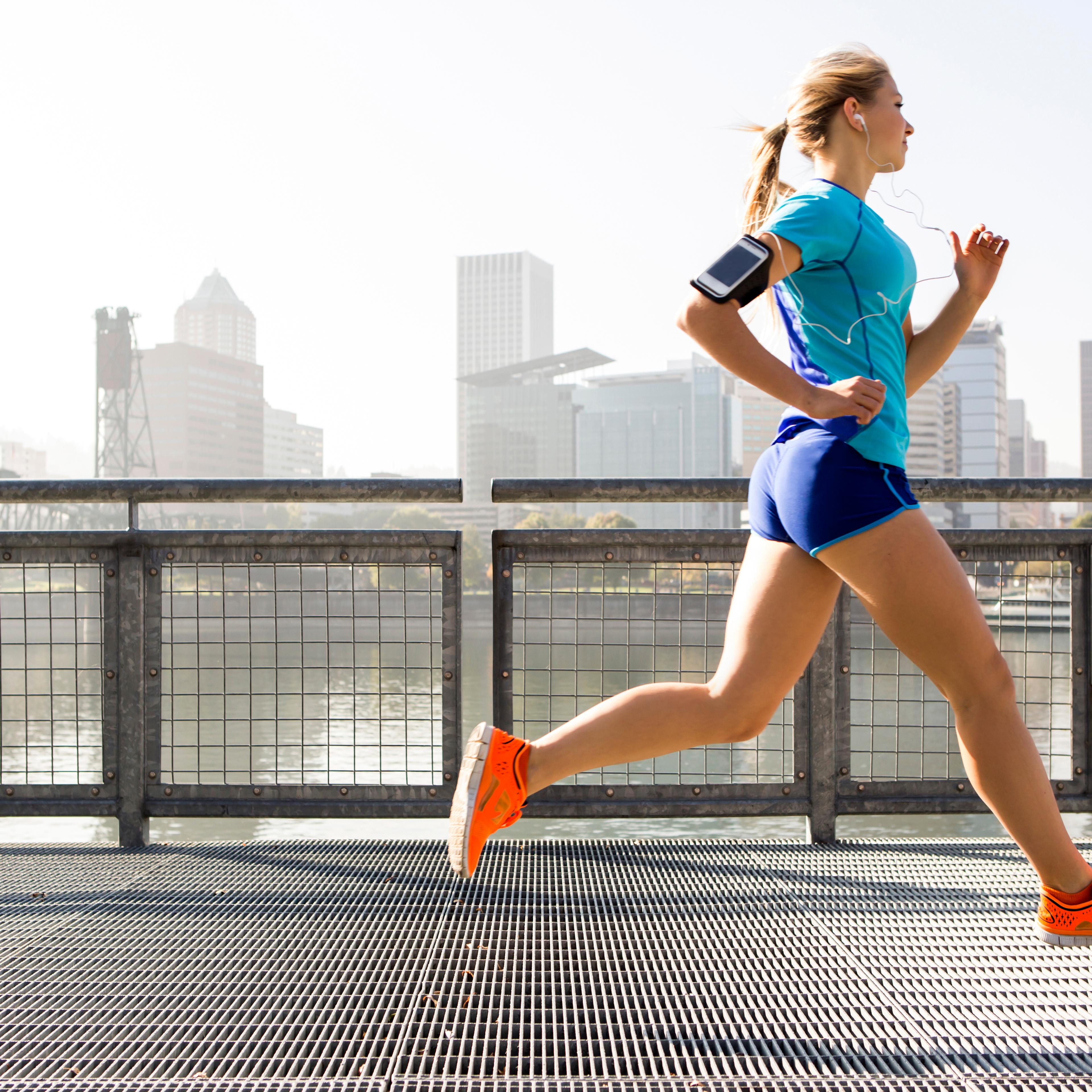 A young girl running for exercise.