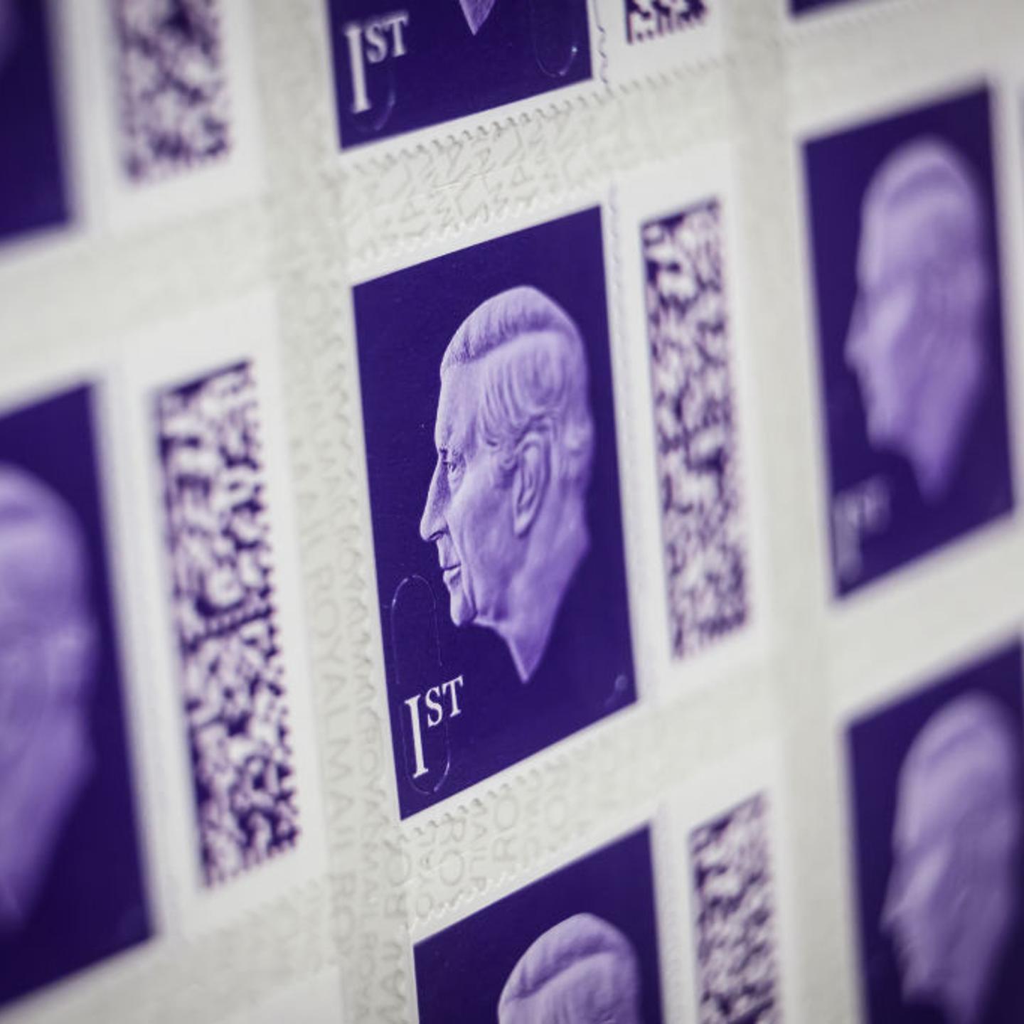 A sheet of the new first class stamps featuring a likeness of King Charles III is seen in a display case at the Royal Mail Museum on Feb. 08, 2023 in London.