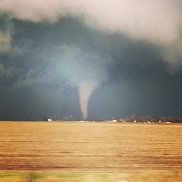 A tornado is seen in Ashton, IL on April 9, 2015.