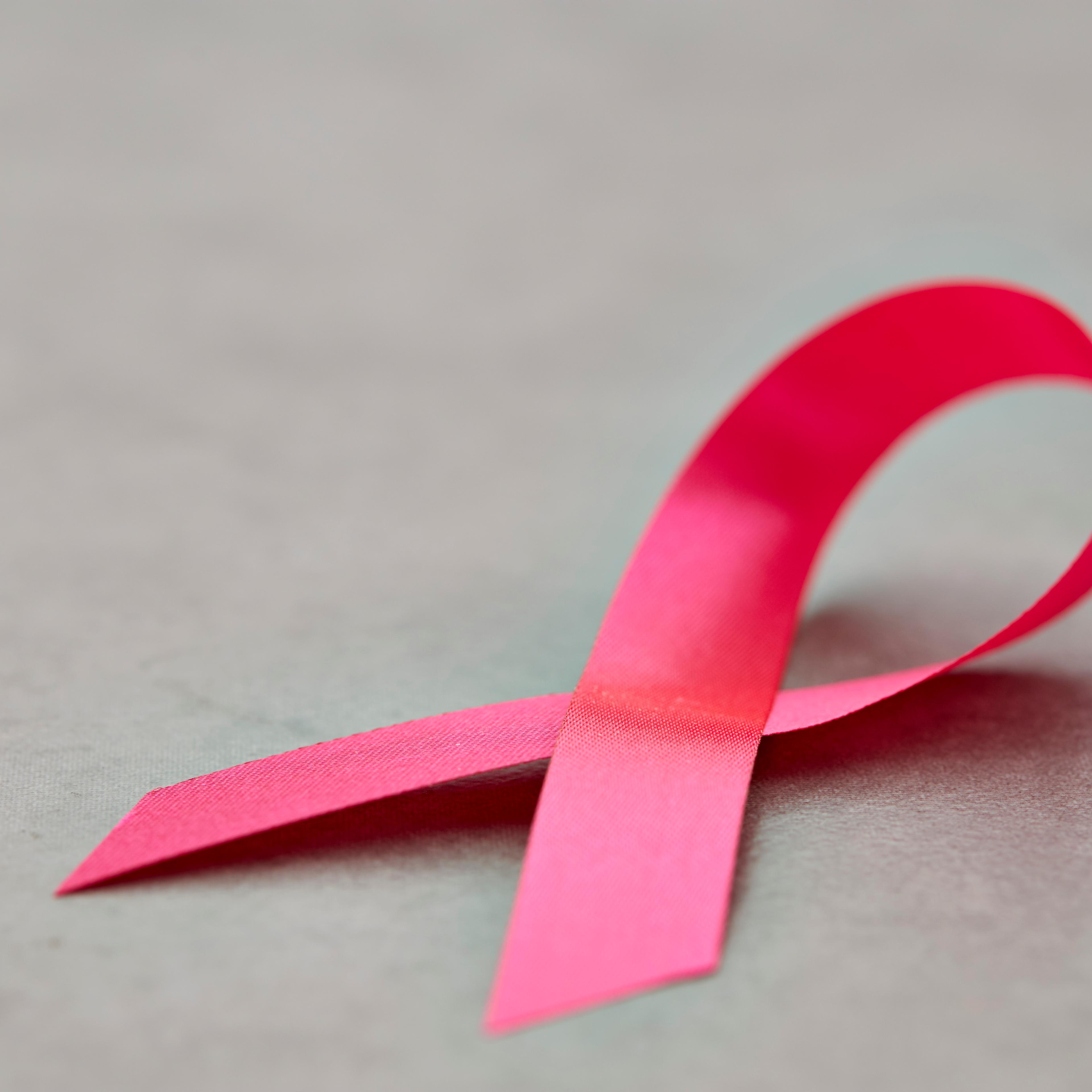 Close-Up Of Aids Awareness Ribbon On Table