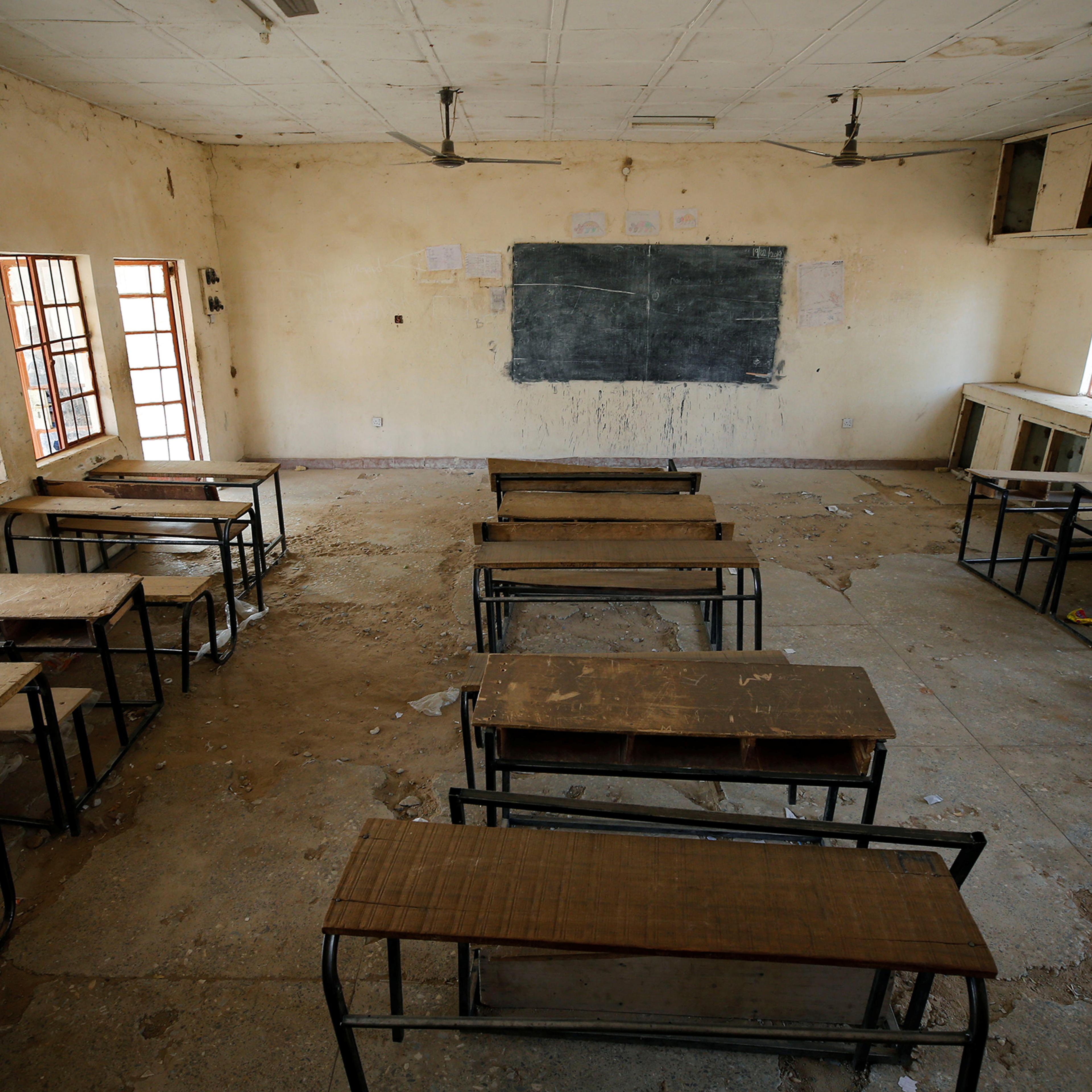 A view shows an empty classroom at the school in Dapchi in the northeastern state of Yobe, where dozens of school girls went missing after an attack on the village by Boko Haram