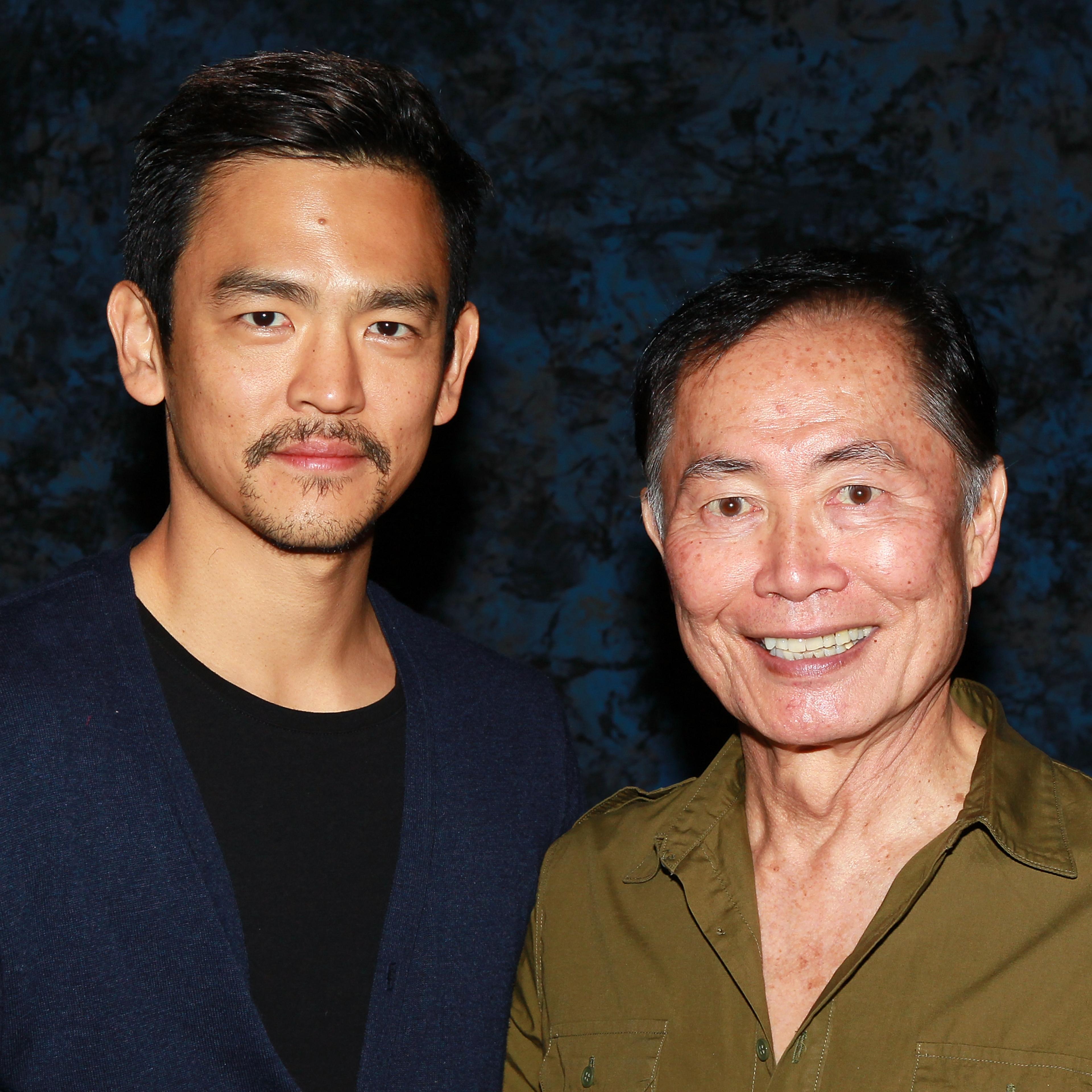 John Cho (L) and George Takei attend the Official Star Trek Convention on August 14, 2011 in Las Vegas, Nevada.