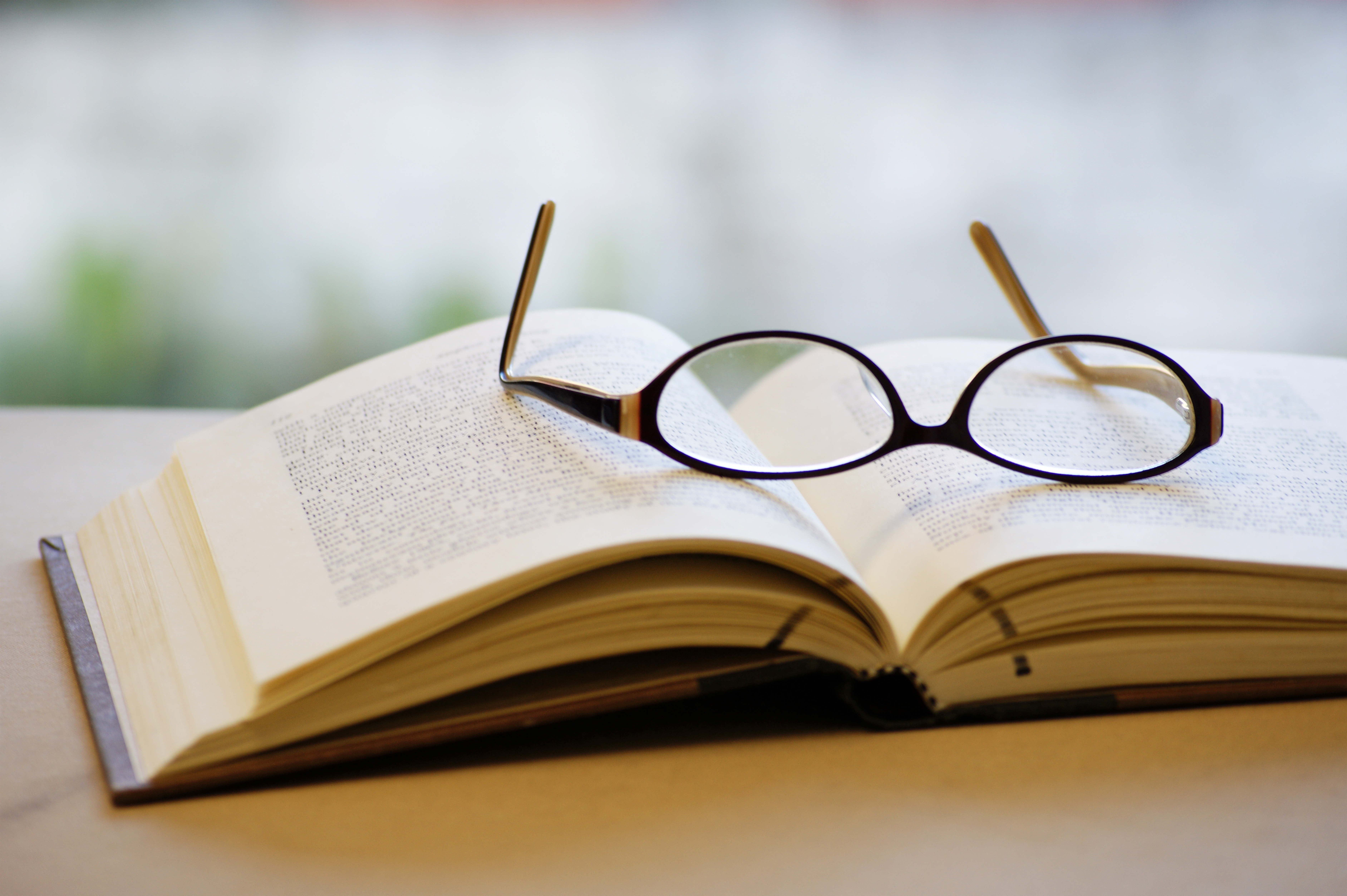 open-book-glasses-table