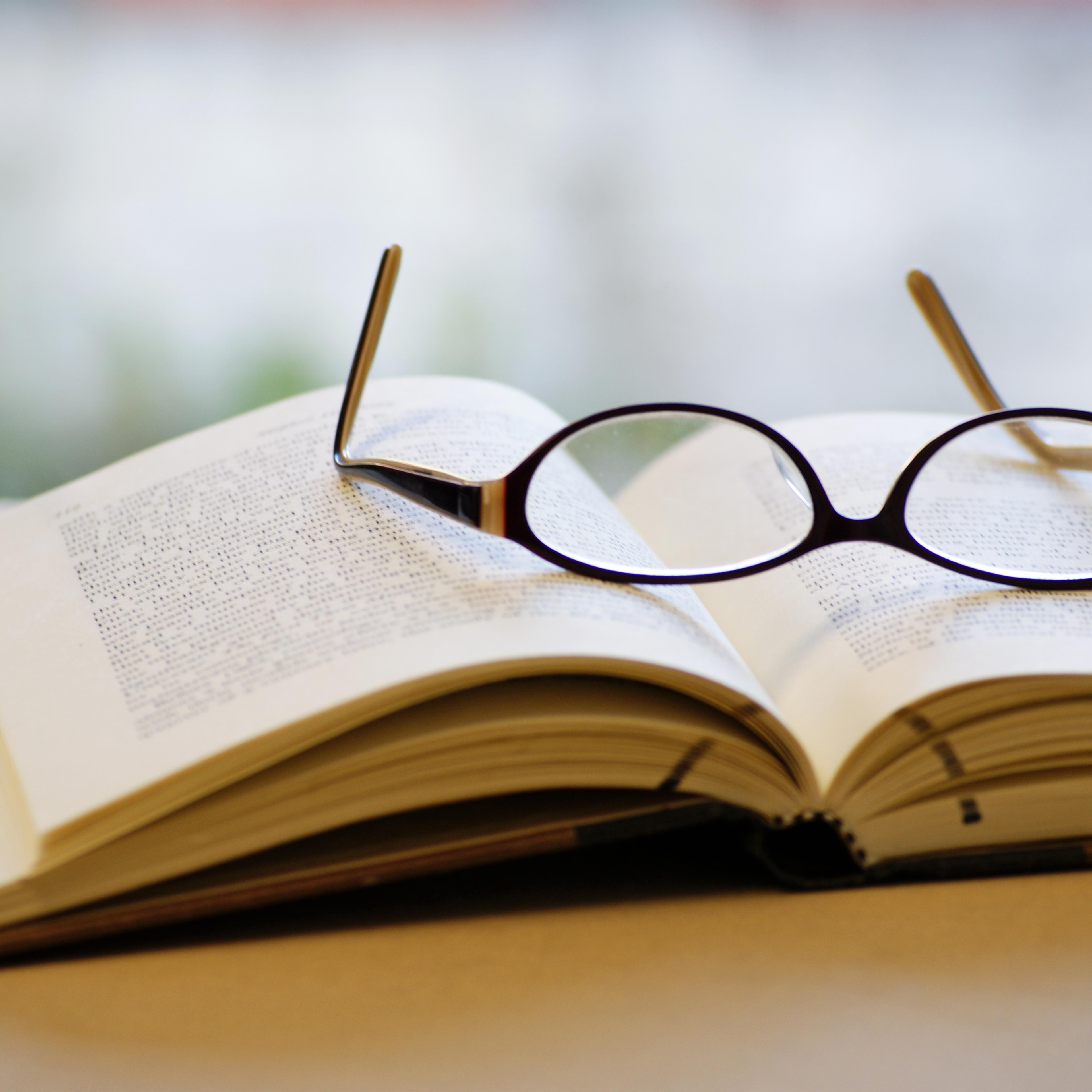 open-book-glasses-table