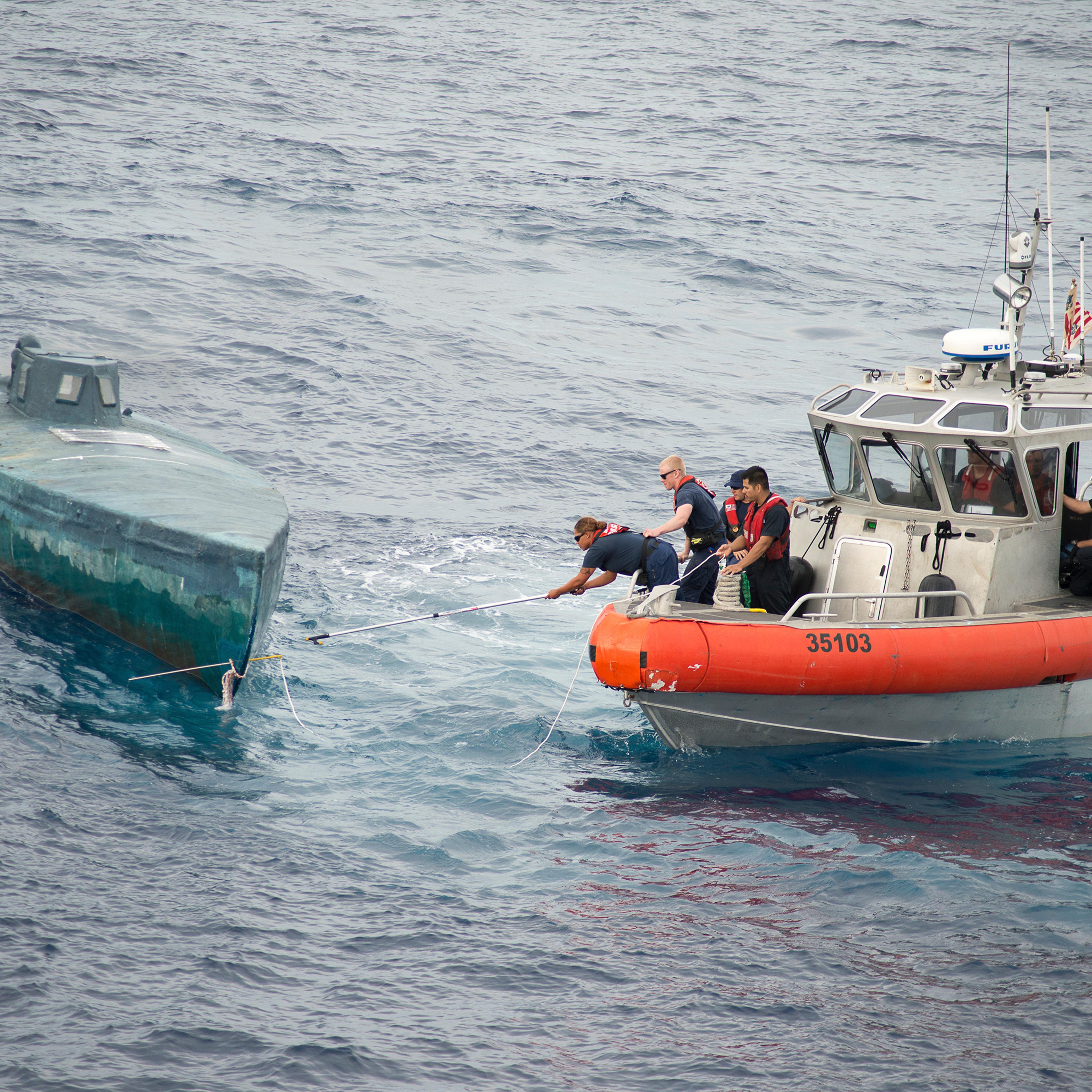 Crew from the U.S. Coast Guard Cutter Stratton stop a Self-Propelled Semi Submersible off the coast of Central America in this U.S. Coast Guard picture taken July 18, 2015 and released August 5, 2015.