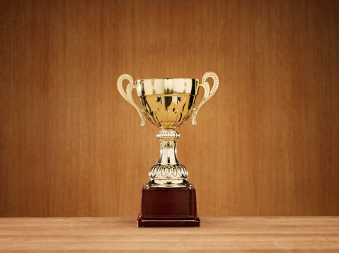 trophy-wooden-background