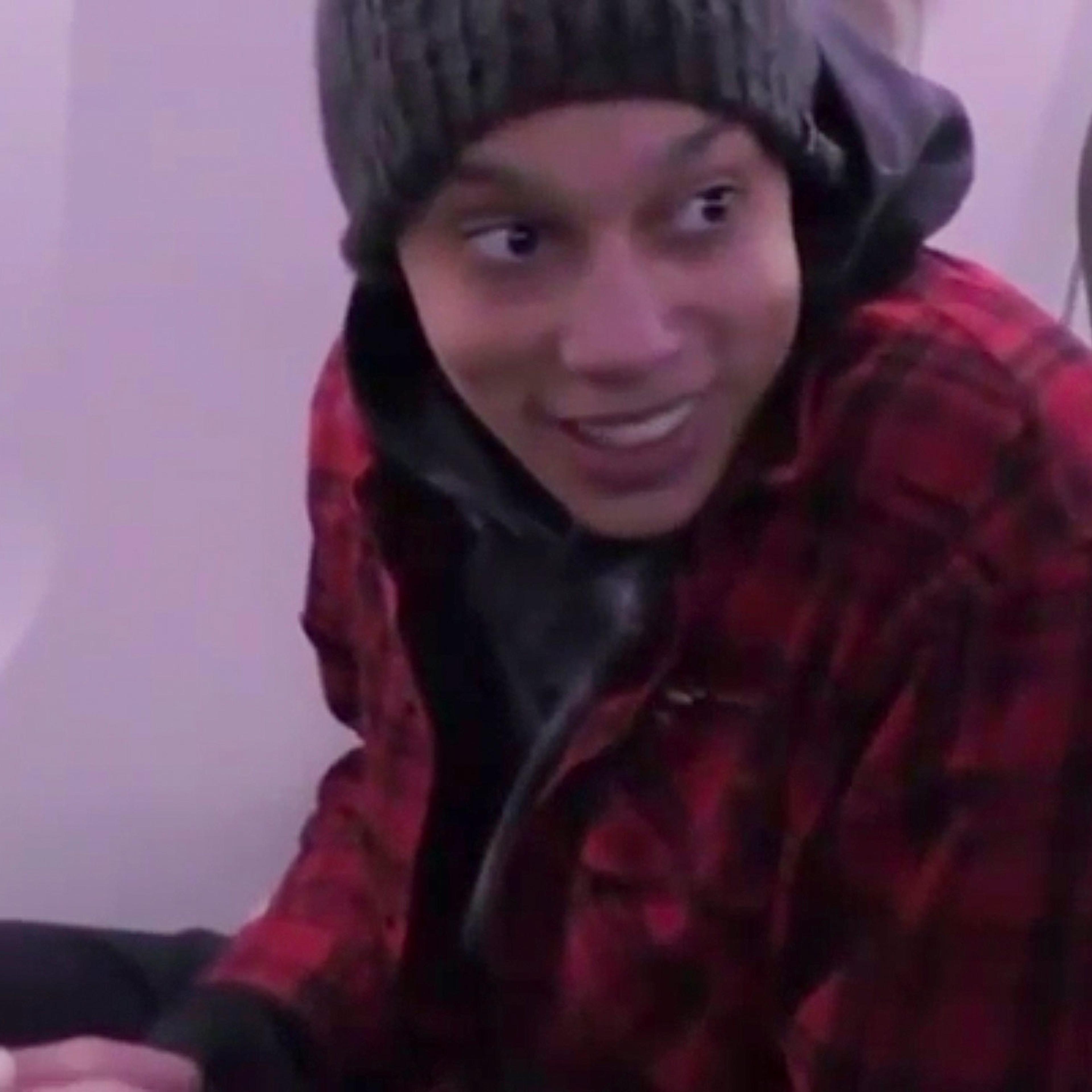 In this image made from video provided by Russian Federal Security Service, WNBA star and two-time Olympic gold medalist Brittney Griner sits in the plane as she flies to Abu Dhabi to be exchanged for Russian citizen Viktor Bout, in Russia, Friday, Dec.
