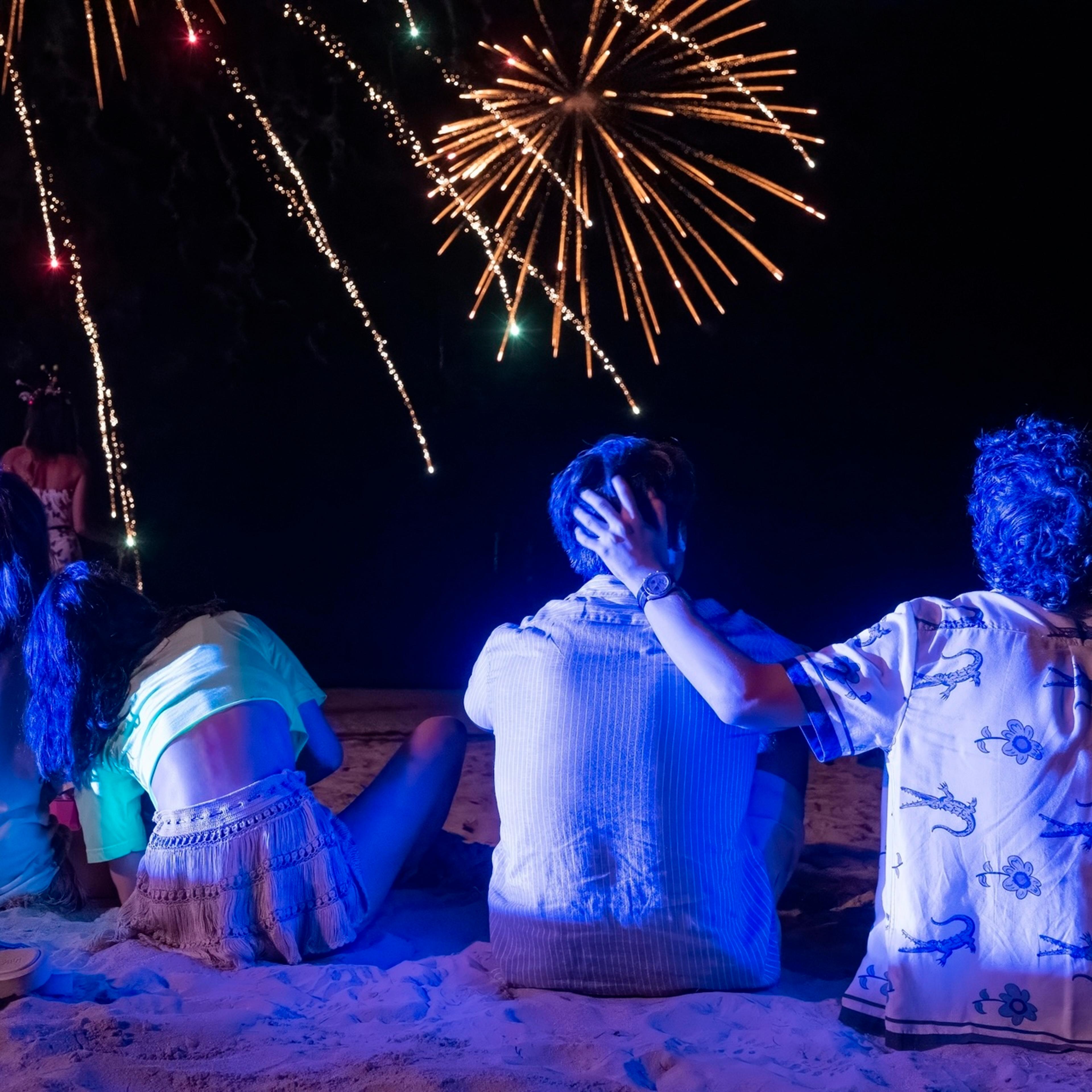 The White Lotus' Aimee Lou Wood, Charlotte Le Bon, Patrick Schwarzenegger, and Sam Nivola in a scene set at the Full Moon Party