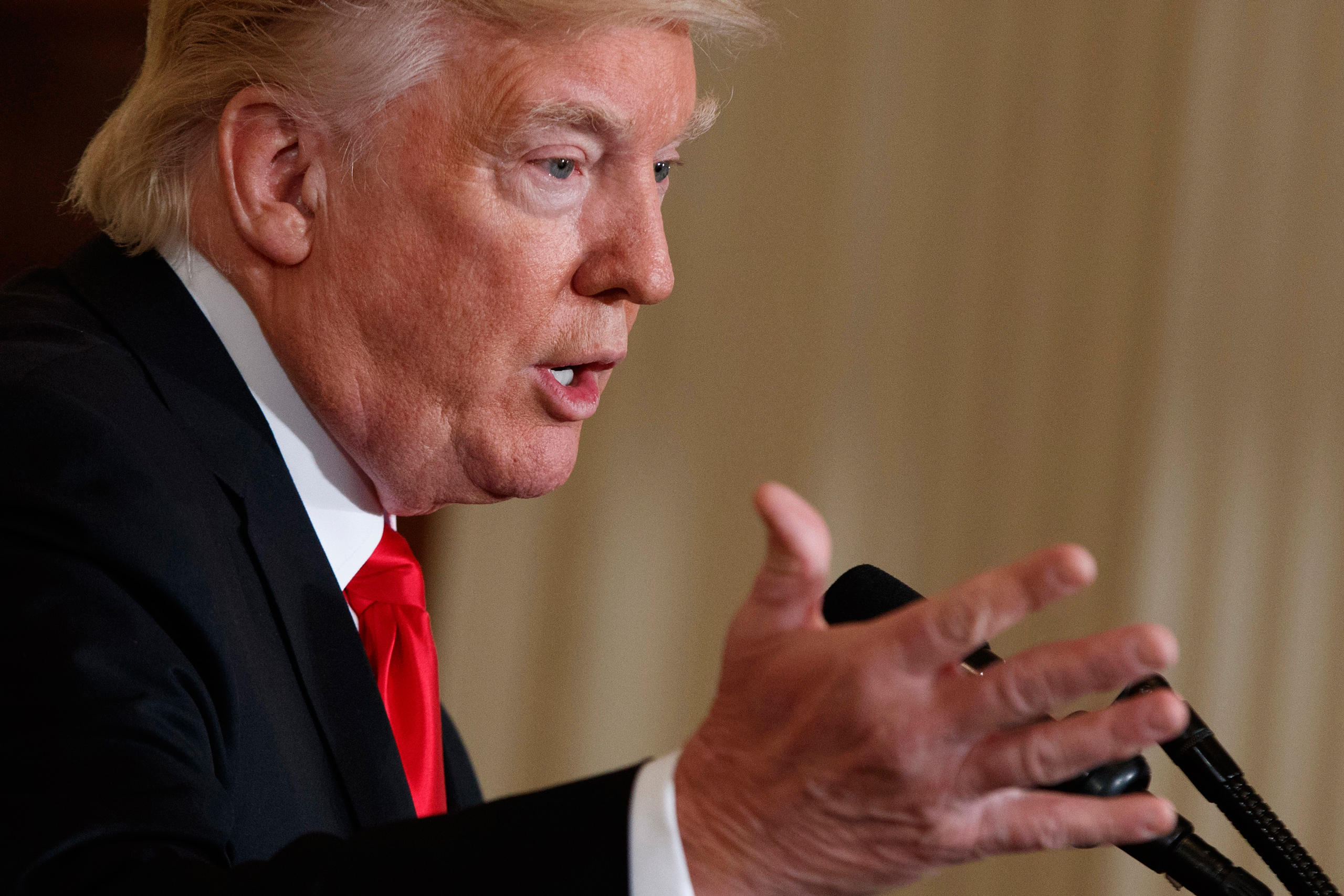 FILE In this Jan. 27, 2017 file photo, President Donald Trump speaks in the East Room of the White House in Washington. Trump hammered Hillary Clinton for months for not following the rules when it comes to government records. But a week into his preside