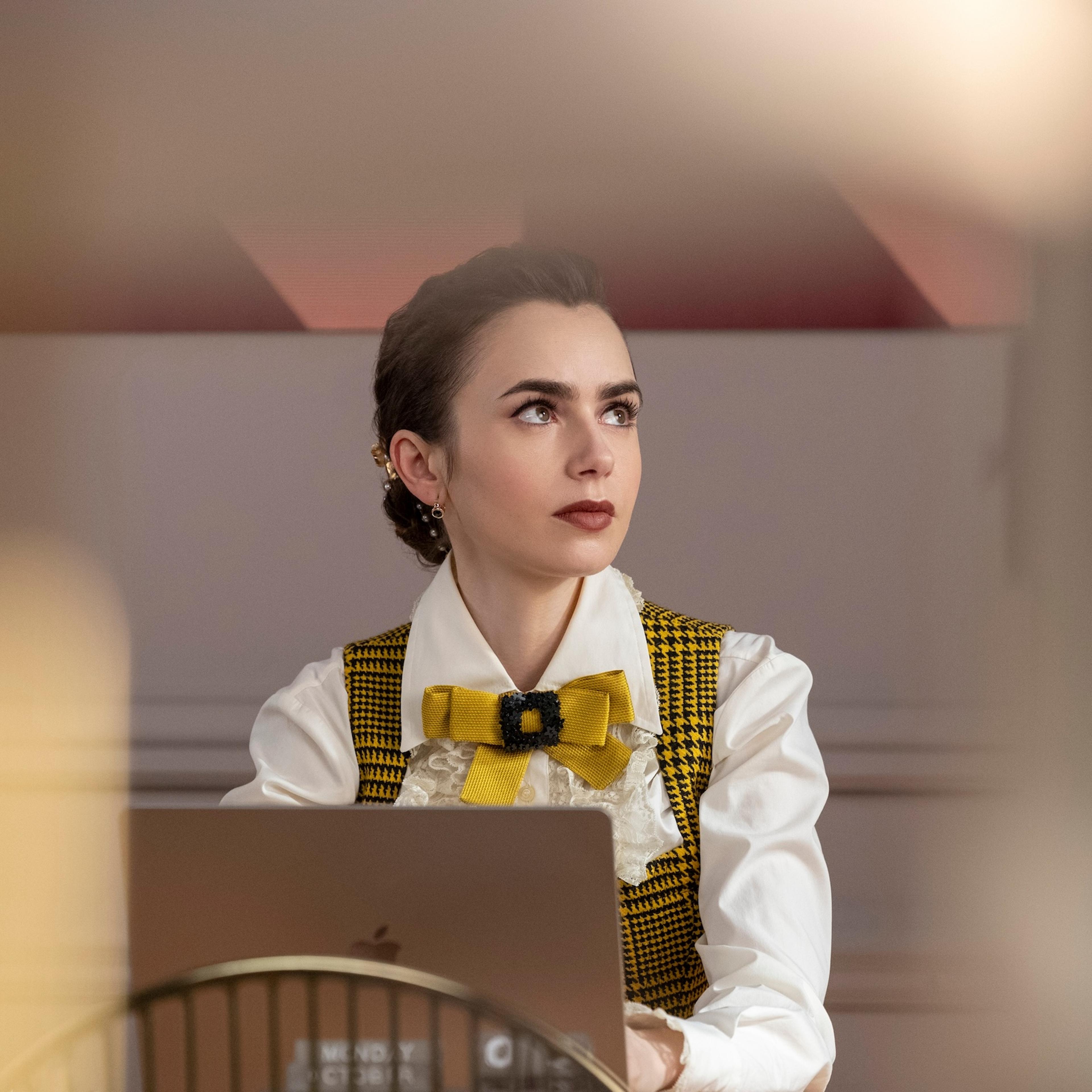 Emily in Paris. Lily Collins as Emily in episode 404 of Emily in Paris. Cr. Stephanie Branchu/Netflix © 2024